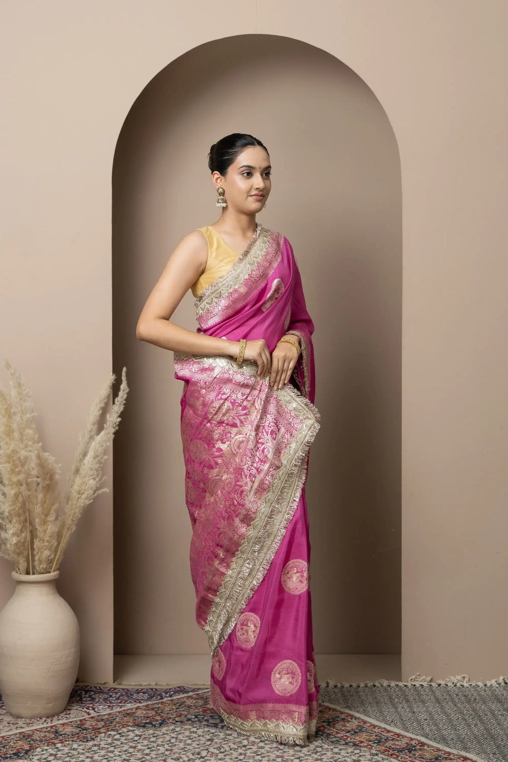 Rani Pink Saree with Regal Gold Zari Work