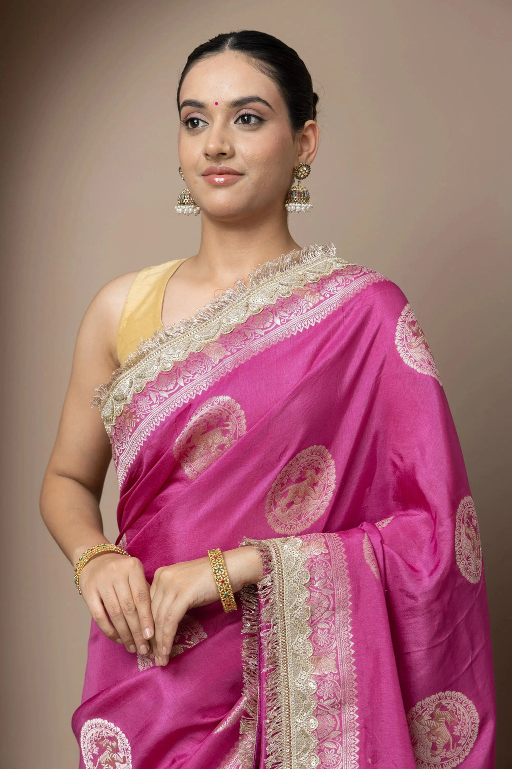 Rani Pink Saree with Regal Gold Zari Work