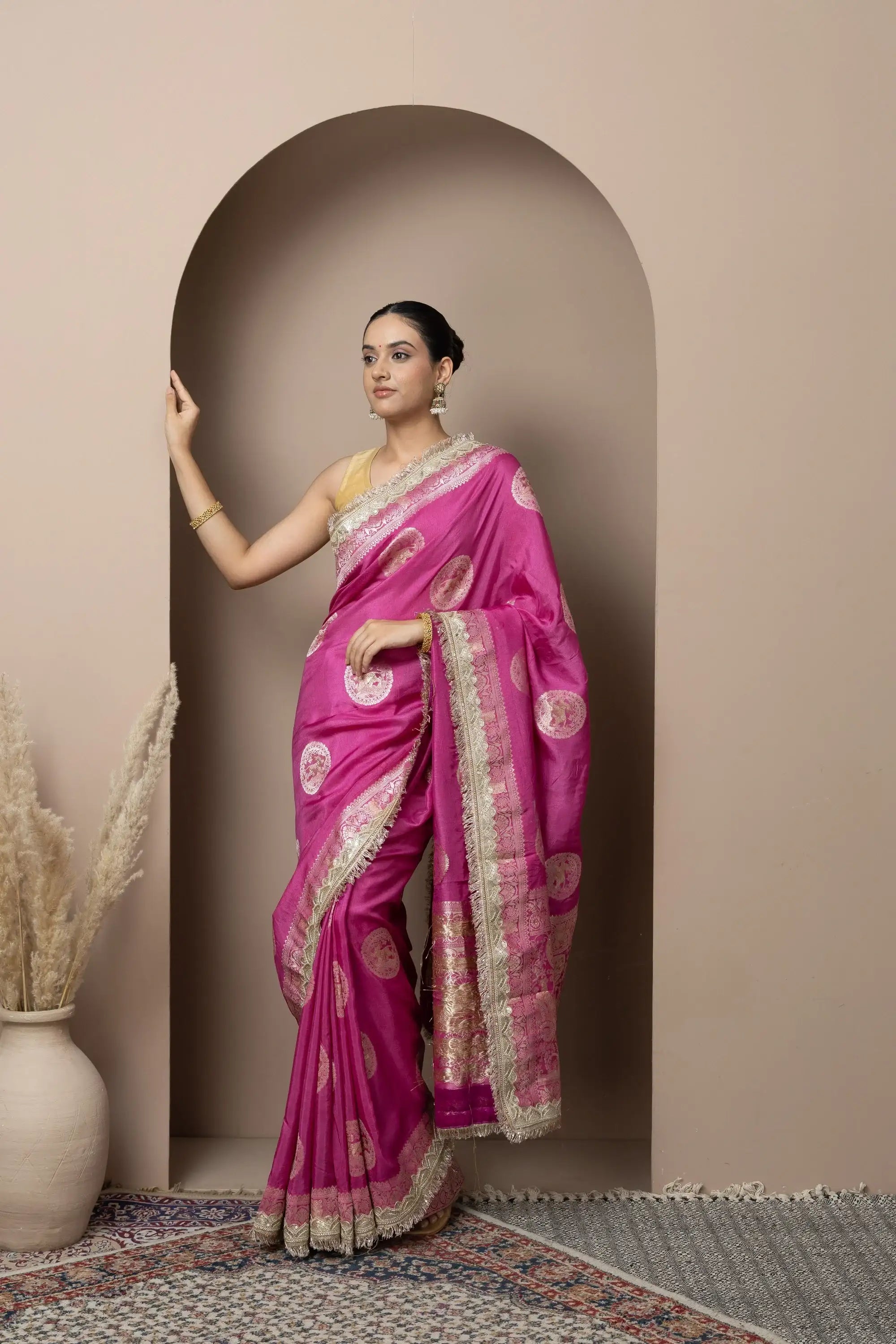 Rani Pink Saree with Regal Gold Zari Work