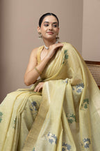 Pastel Yellow Saree with Subtle Green Floral Accents