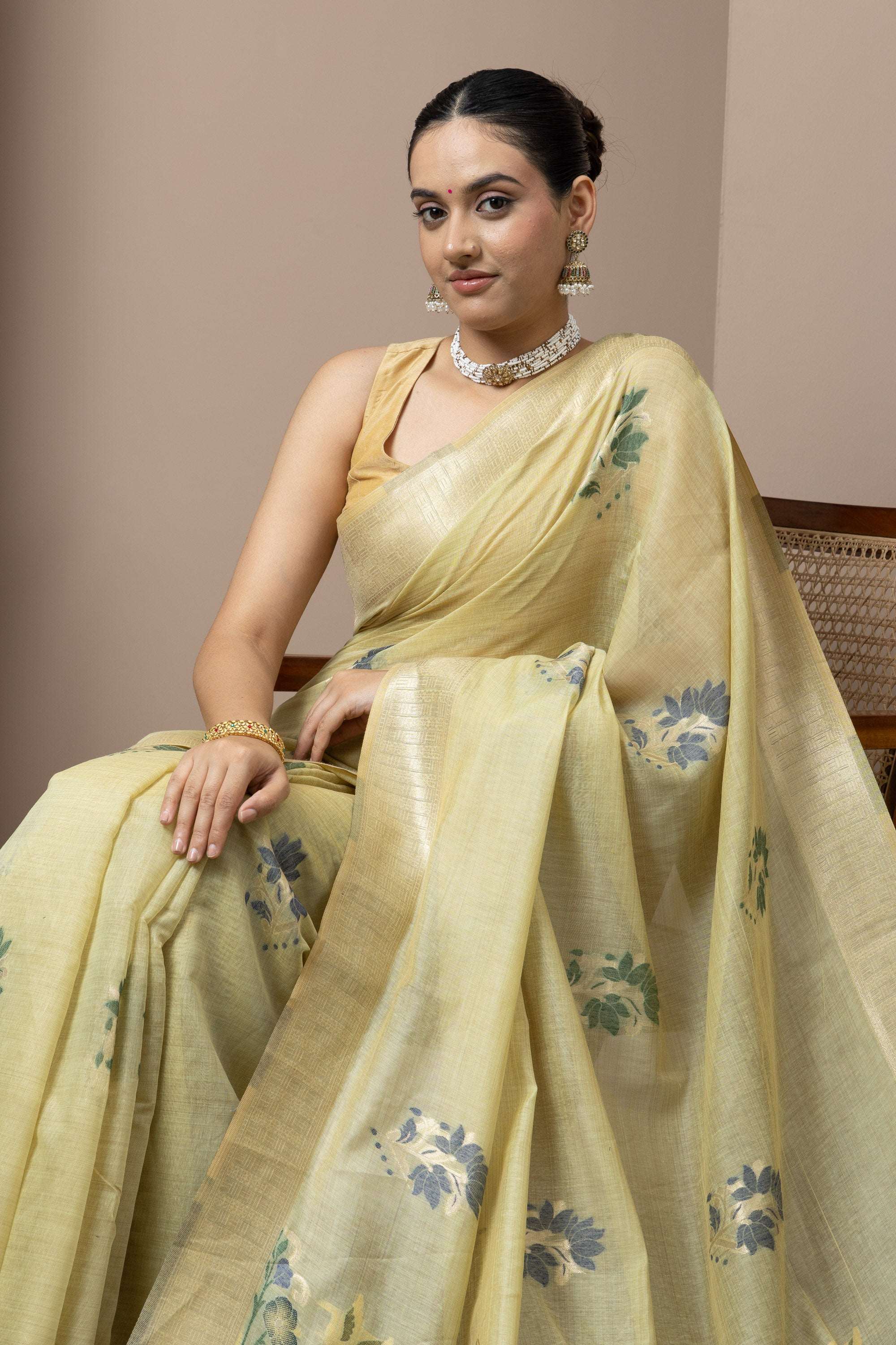 Pastel Yellow Saree with Subtle Green Floral Accents