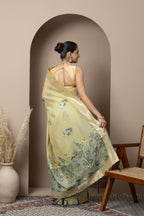 Pastel Yellow Saree with Subtle Green Floral Accents