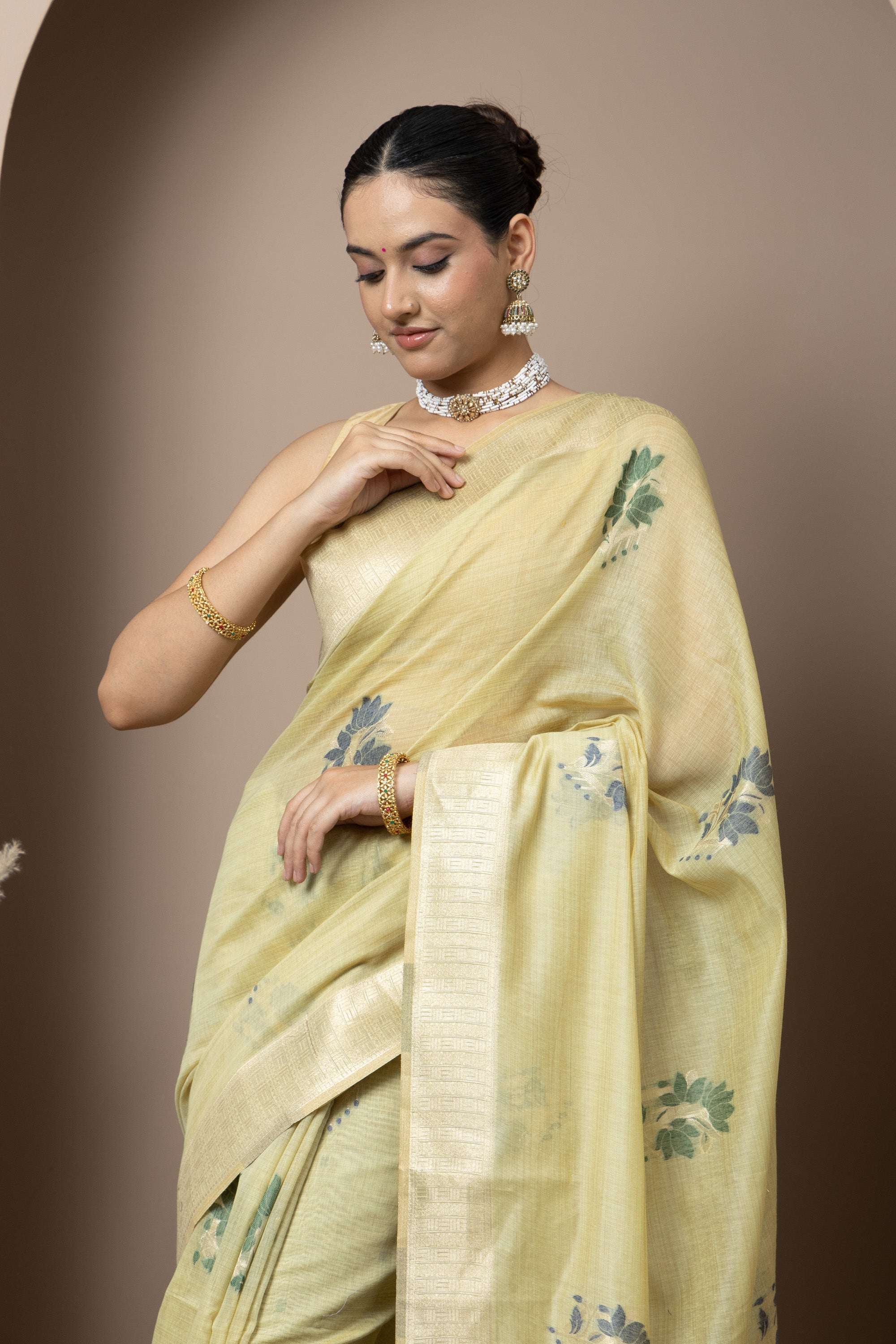 Pastel Yellow Saree with Subtle Green Floral Accents