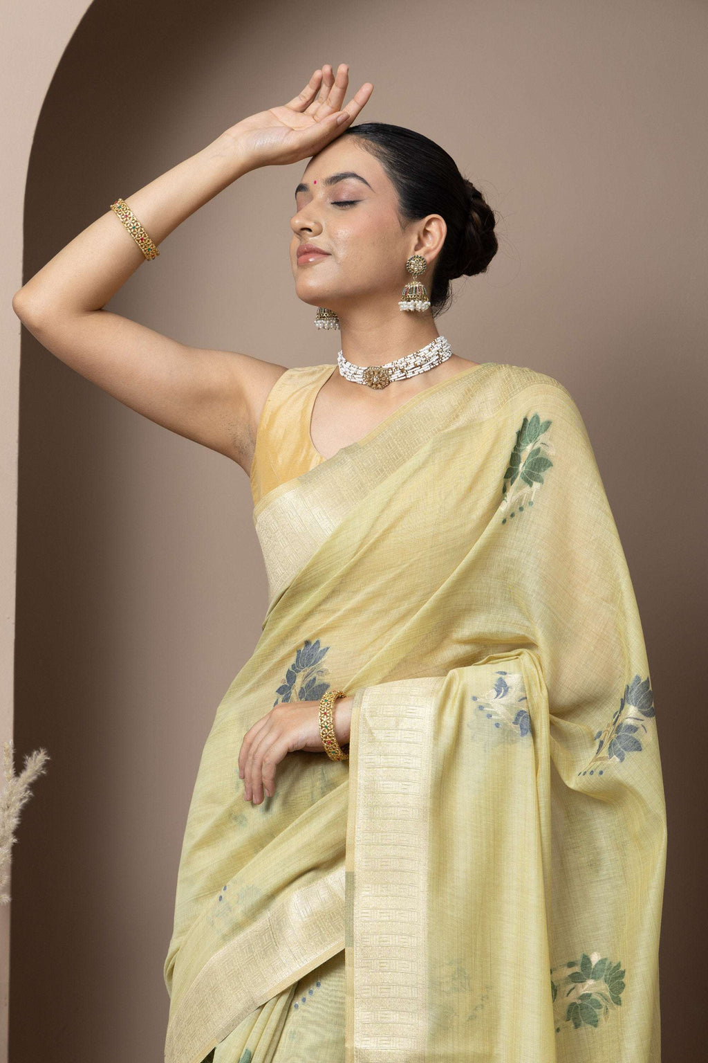 Pastel Yellow Saree with Subtle Green Floral Accents