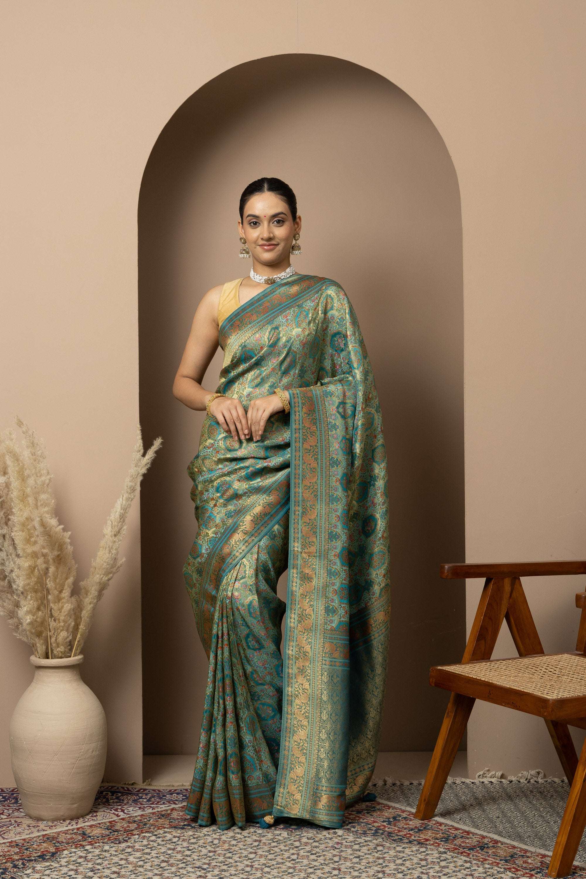 Teal Green Saree with Opulent Gold Zari Weaving