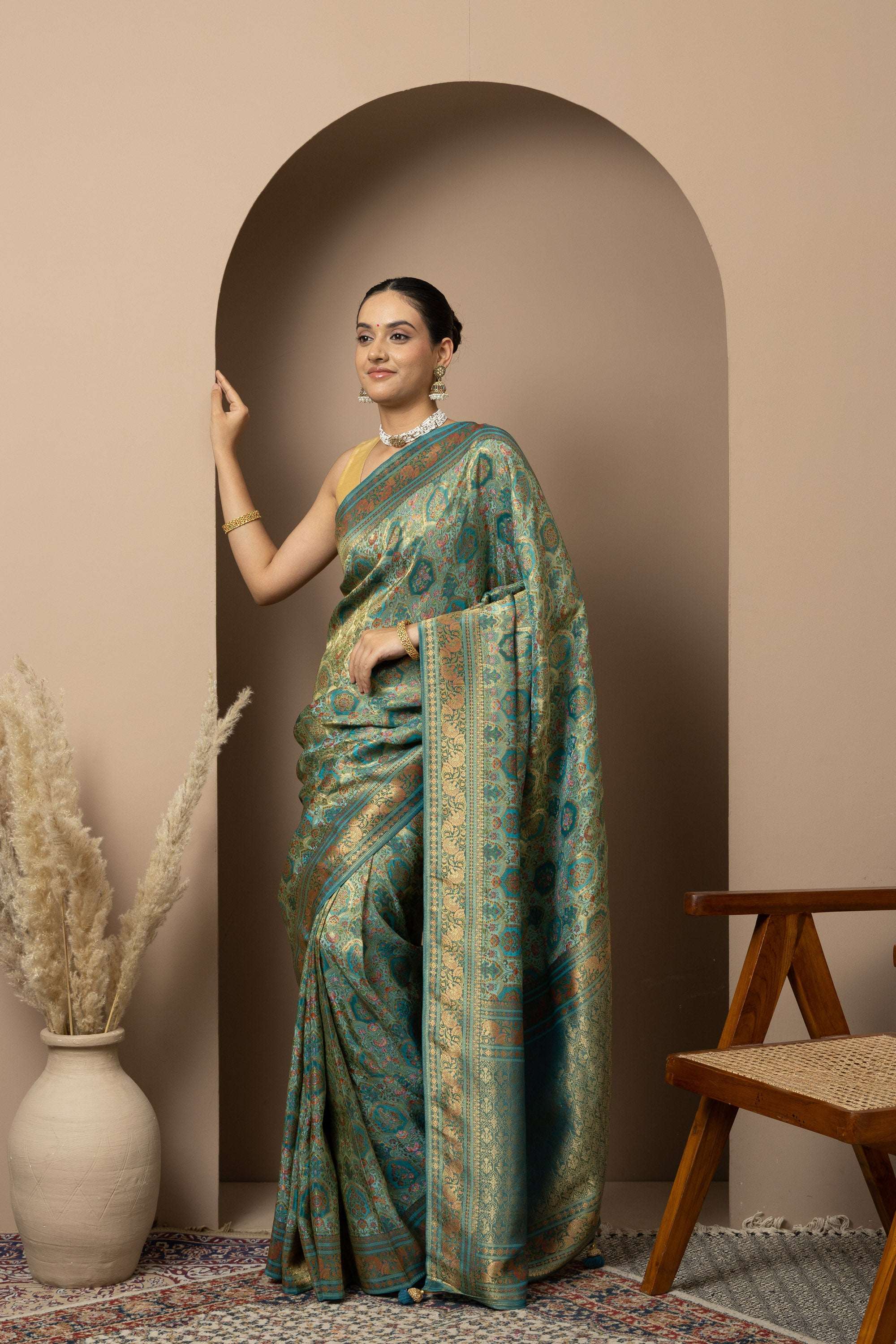 Teal Green Saree with Opulent Gold Zari Weaving