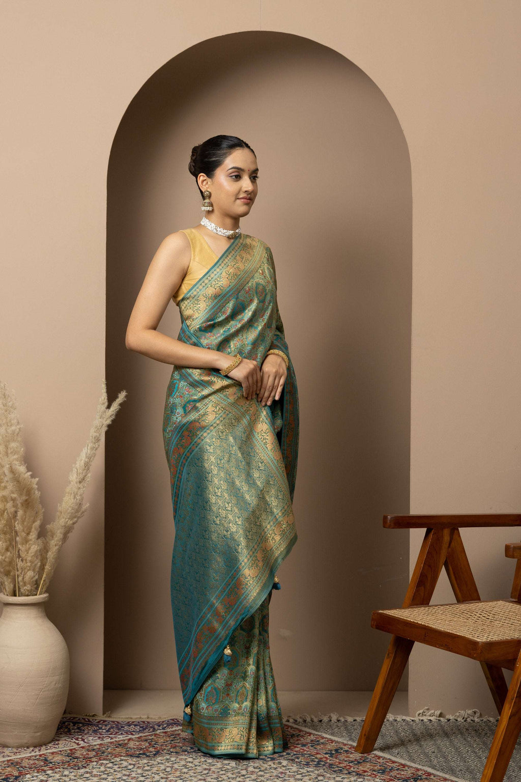 Teal Green Saree with Opulent Gold Zari Weaving