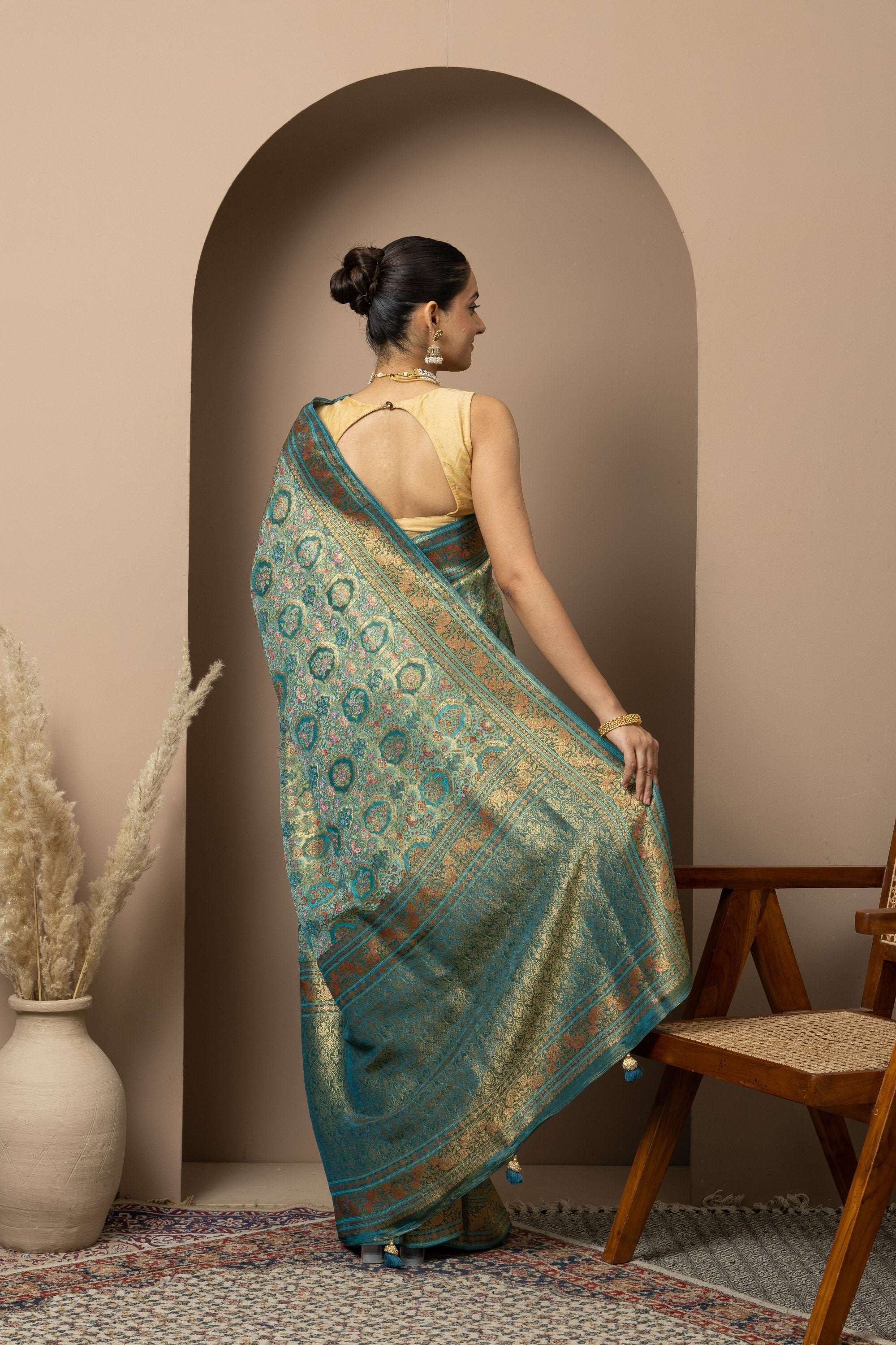 Teal Green Saree with Opulent Gold Zari Weaving