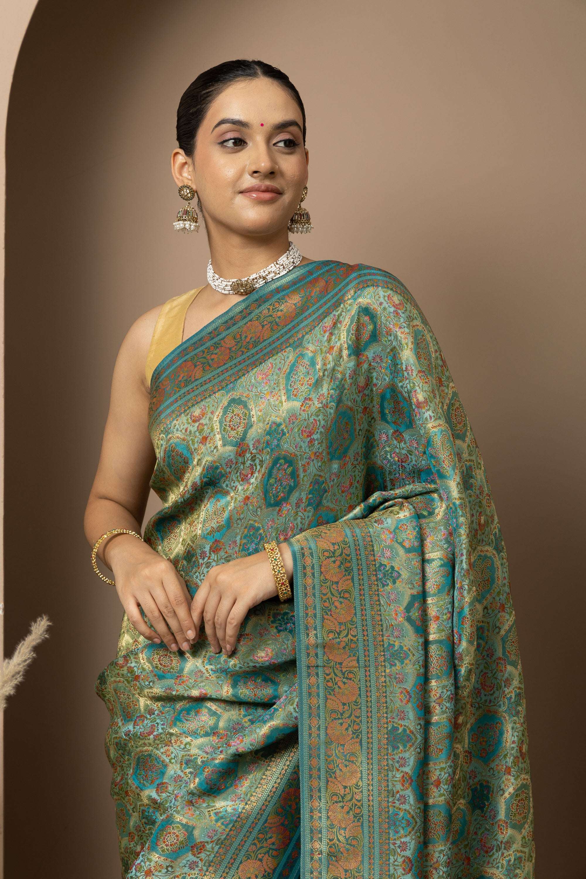 Teal Green Saree with Opulent Gold Zari Weaving
