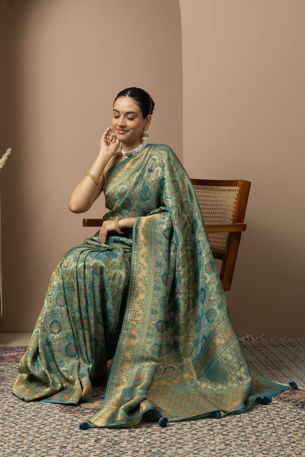Teal Green Saree with Opulent Gold Zari Weaving