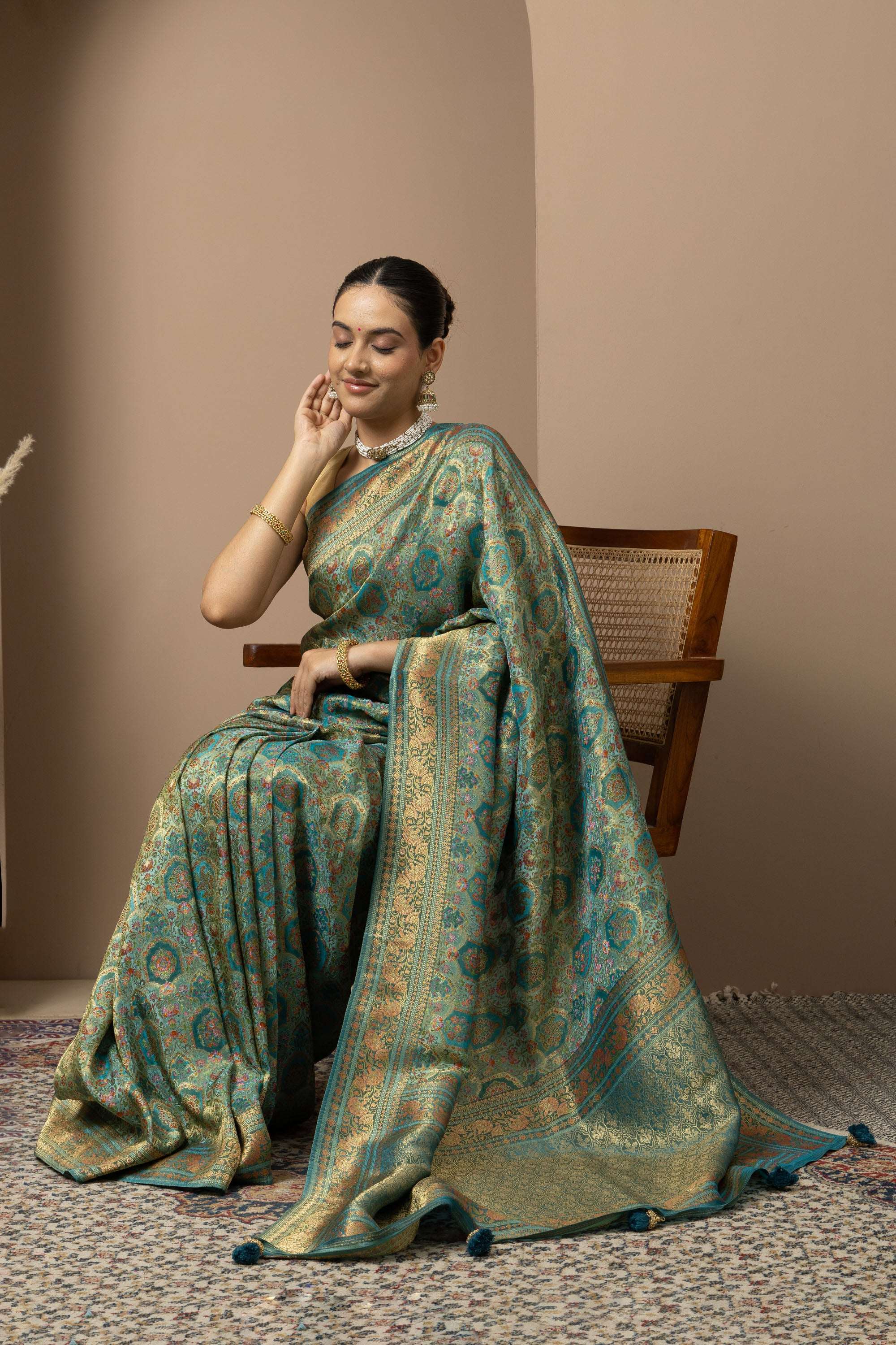 Teal Green Saree with Opulent Gold Zari Weaving