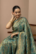 Teal Green Saree with Opulent Gold Zari Weaving