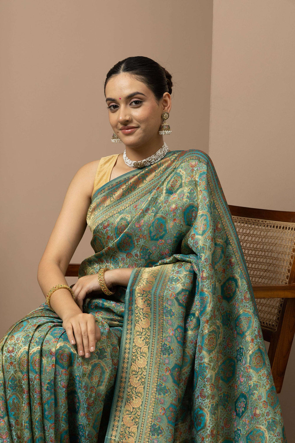 Teal Green Saree with Opulent Gold Zari Weaving