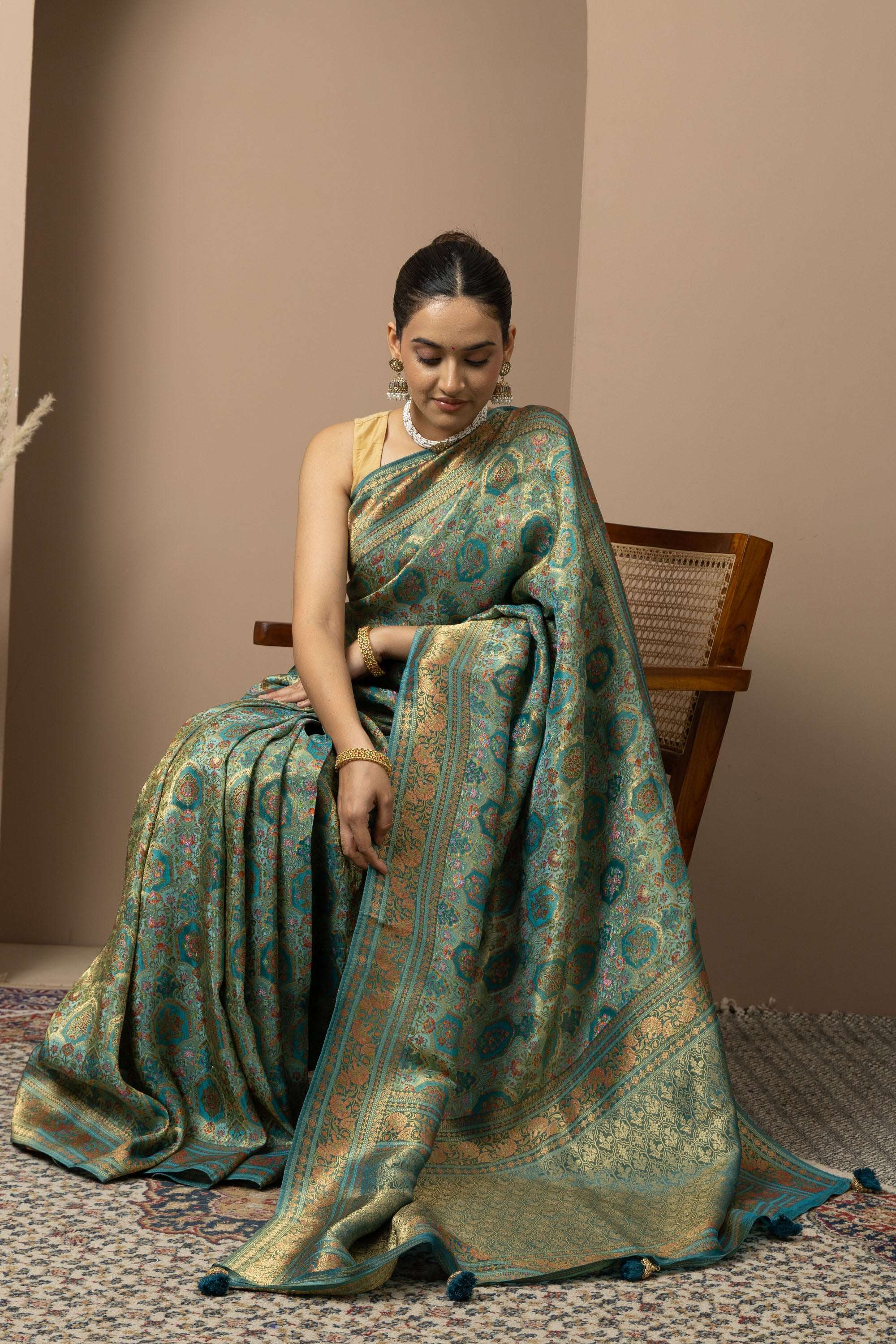 Teal Green Saree with Opulent Gold Zari Weaving