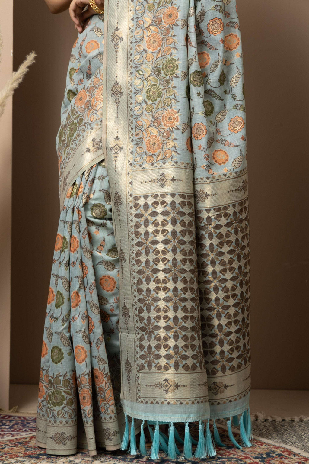 Powder Blue Linen Saree with Multicolour Floral Accents