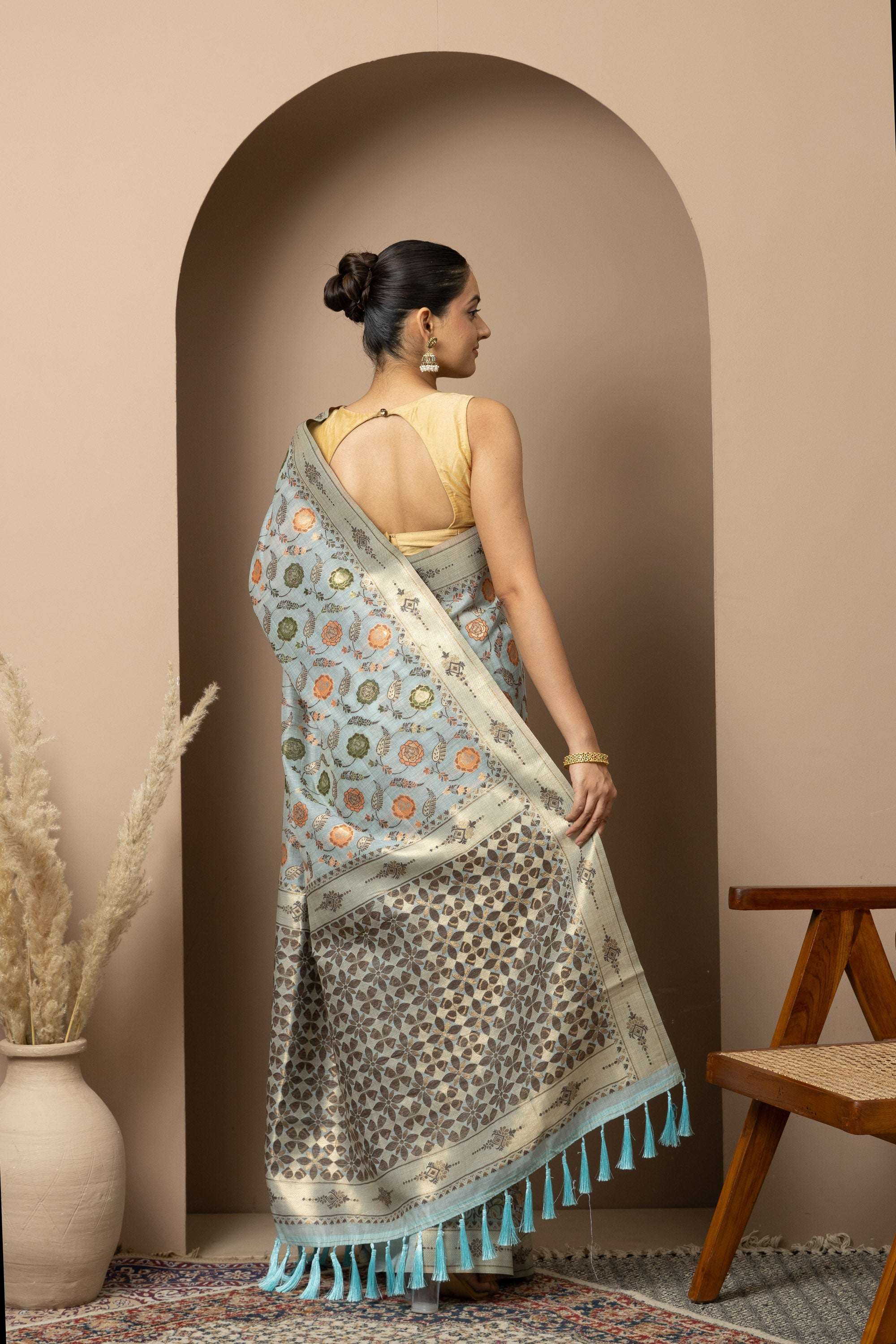Powder Blue Linen Saree with Multicolour Floral Accents