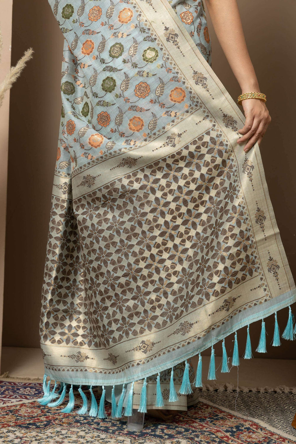 Powder Blue Linen Saree with Multicolour Floral Accents