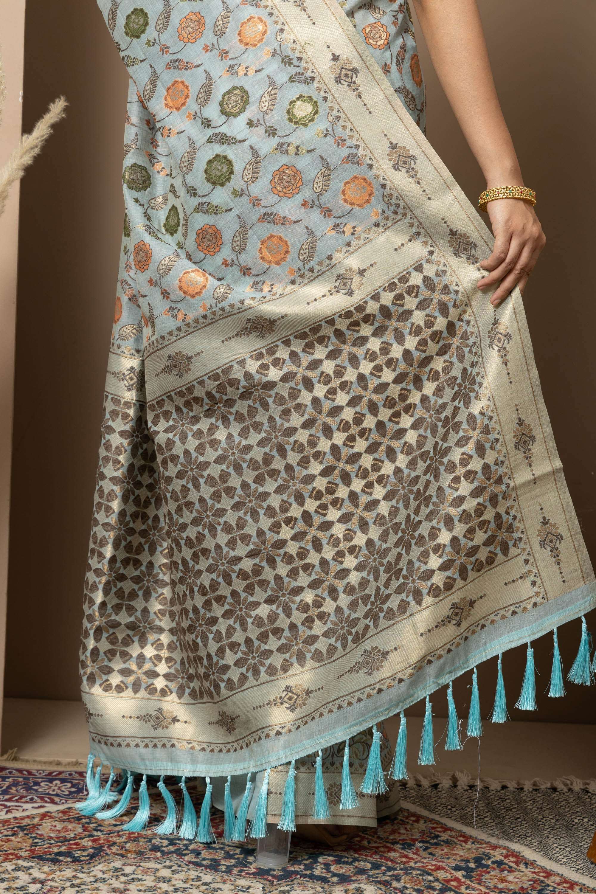 Powder Blue Linen Saree with Multicolour Floral Accents