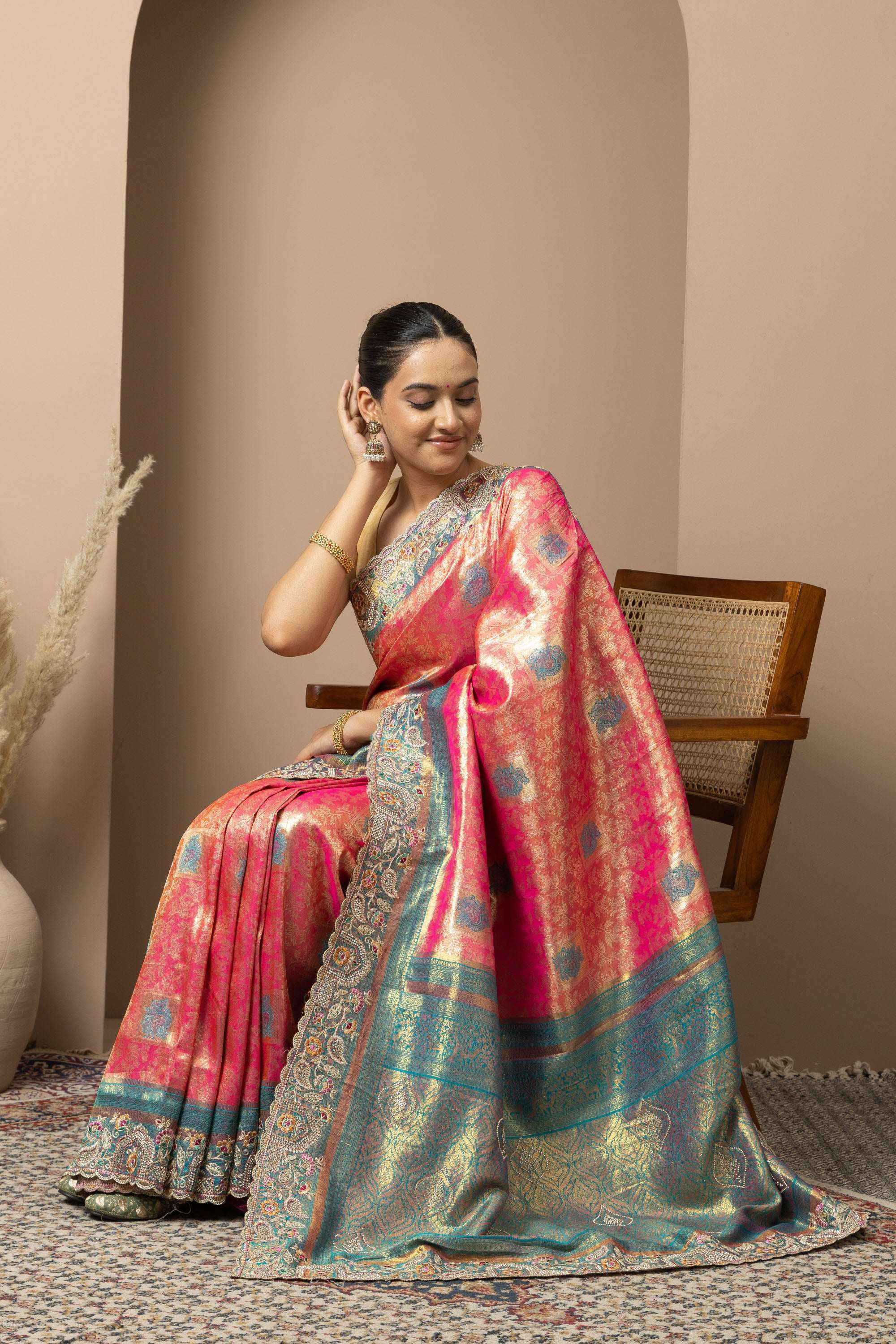 Rani Pink Saree with Teal & Gold Statement Accents