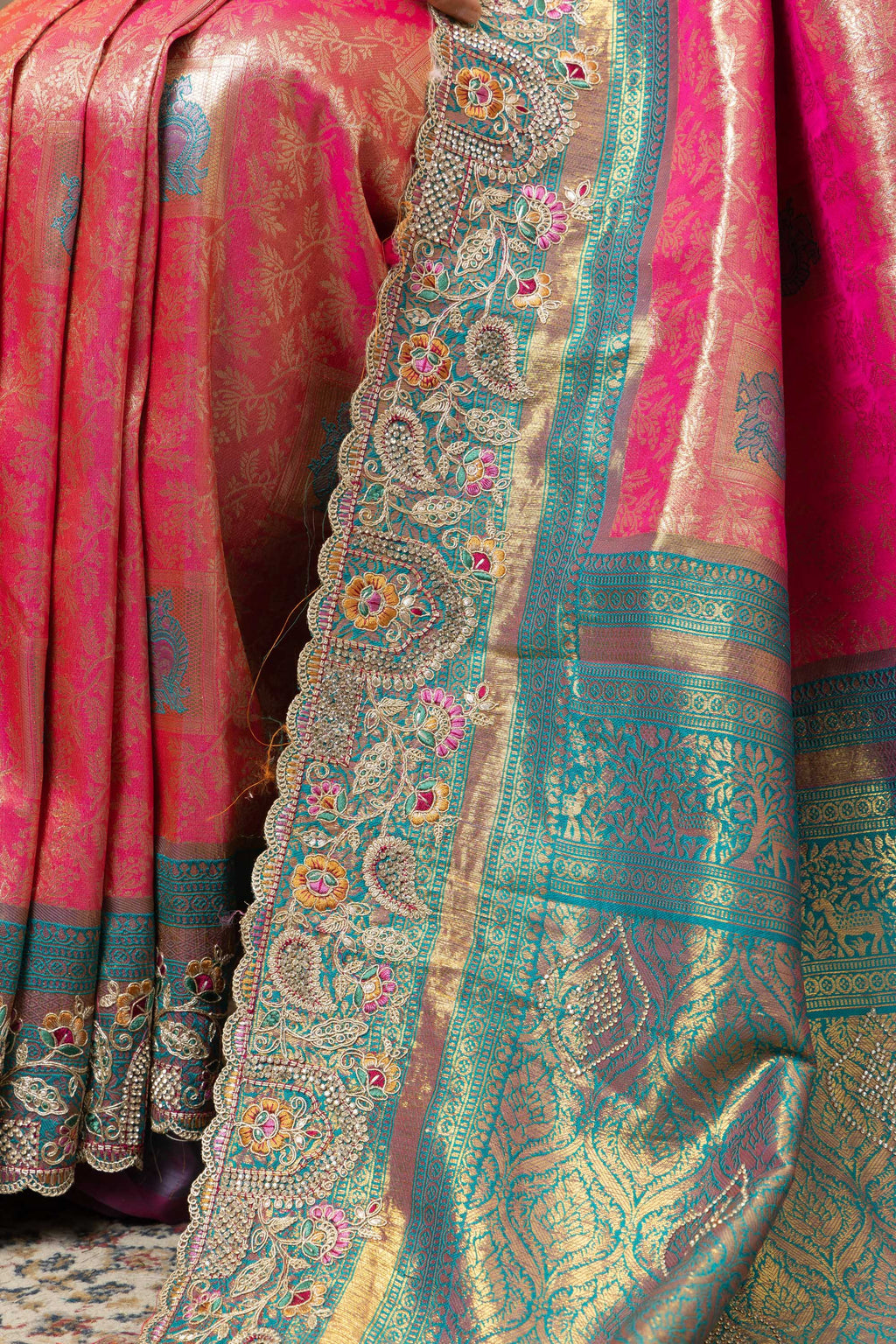 Rani Pink Saree with Teal & Gold Statement Accents
