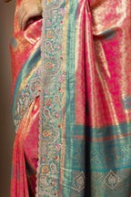 Rani Pink Saree with Teal & Gold Statement Accents