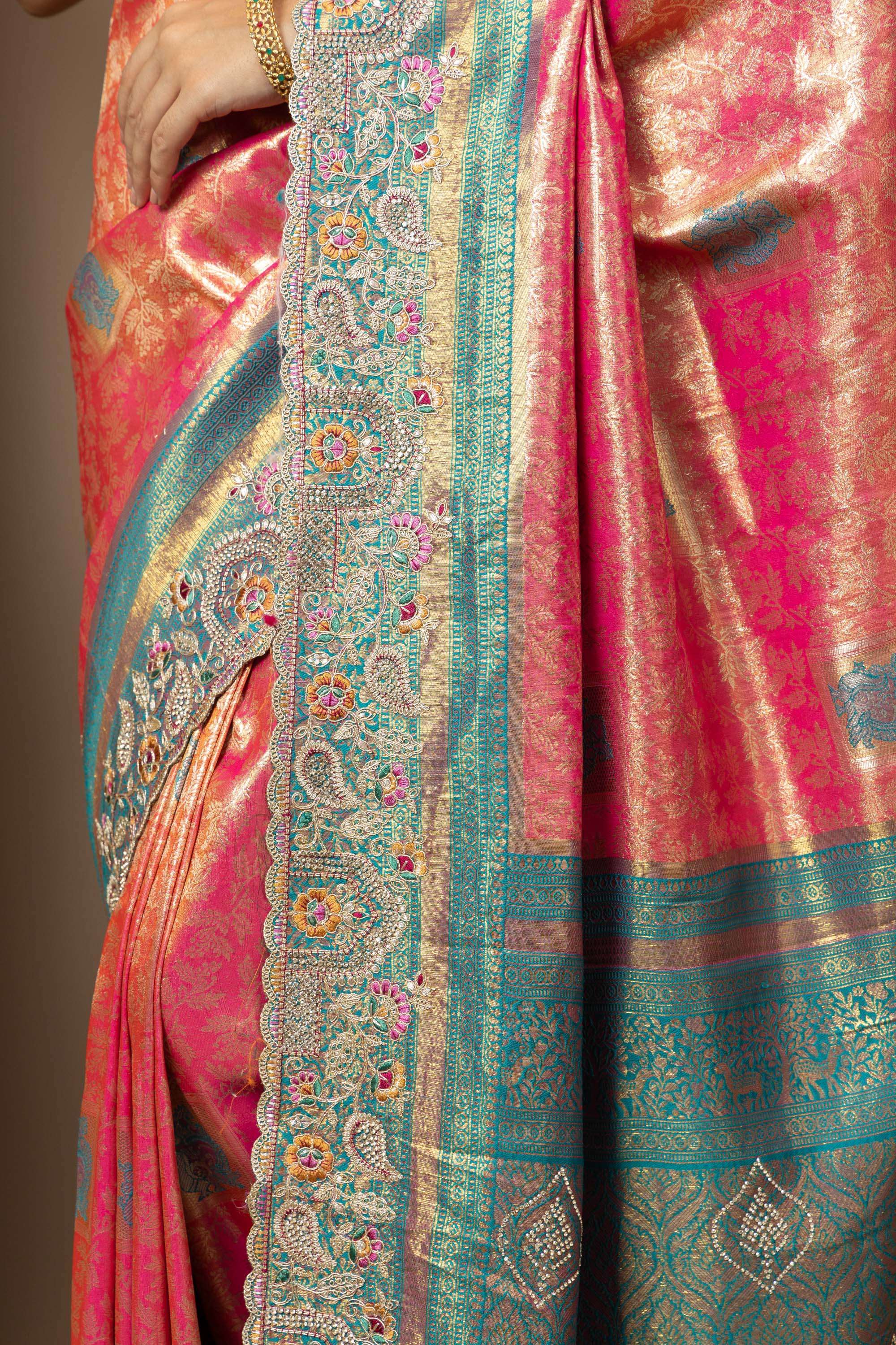 Rani Pink Saree with Teal & Gold Statement Accents