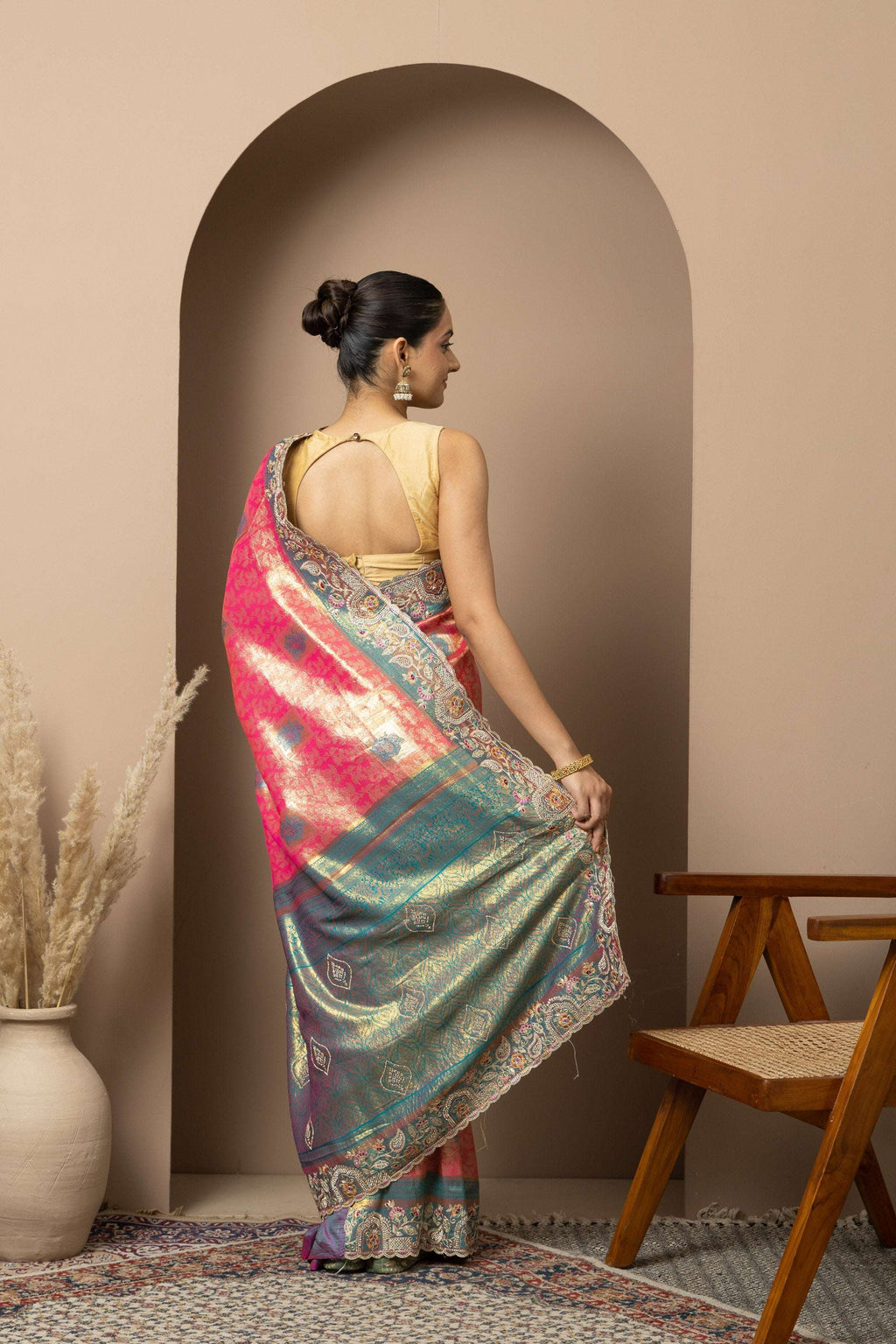 Rani Pink Saree with Teal & Gold Statement Accents