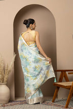 Pastel Aqua Organza Saree with Abstract Tie-Dye Accents