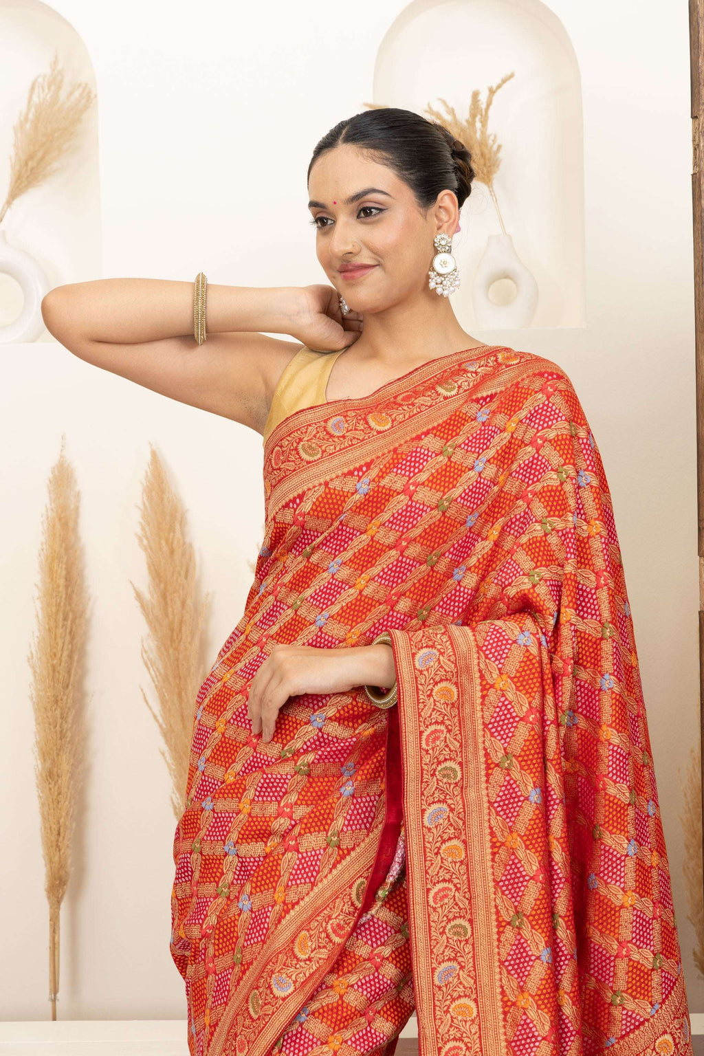 Warm Orange Saree with Multicolor Woven Artistry