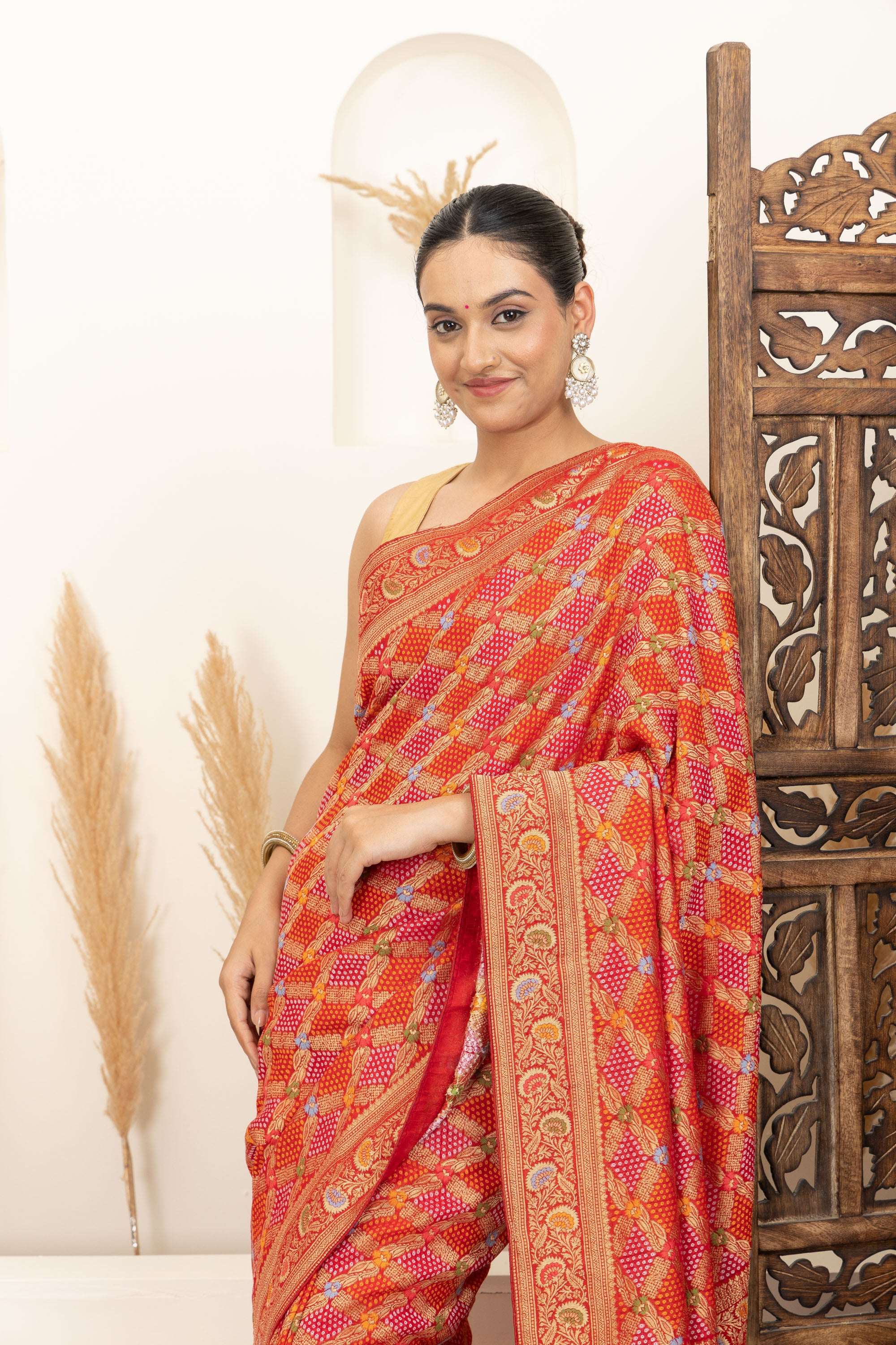 Warm Orange Saree with Multicolor Woven Artistry