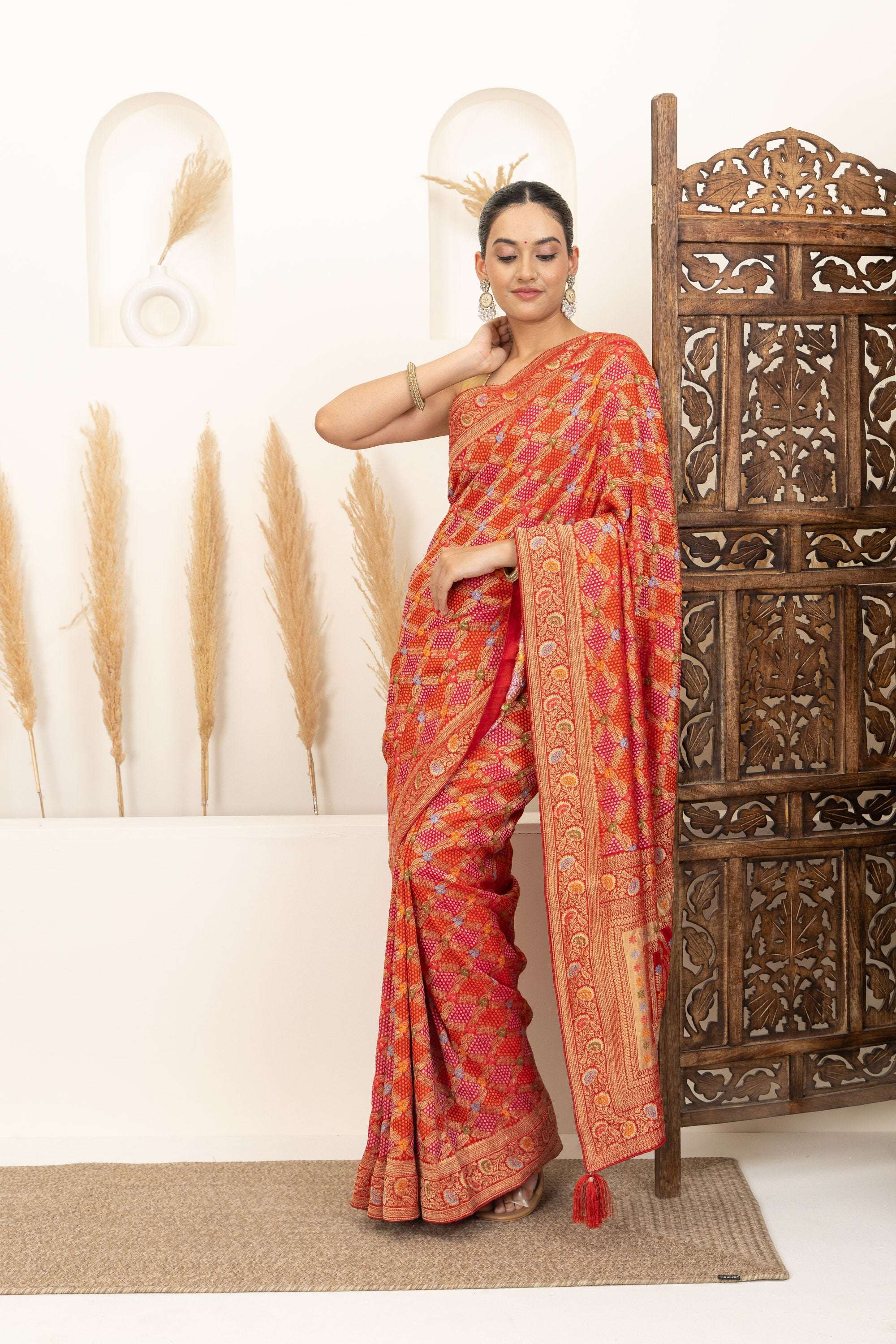 Warm Orange Saree with Multicolor Woven Artistry