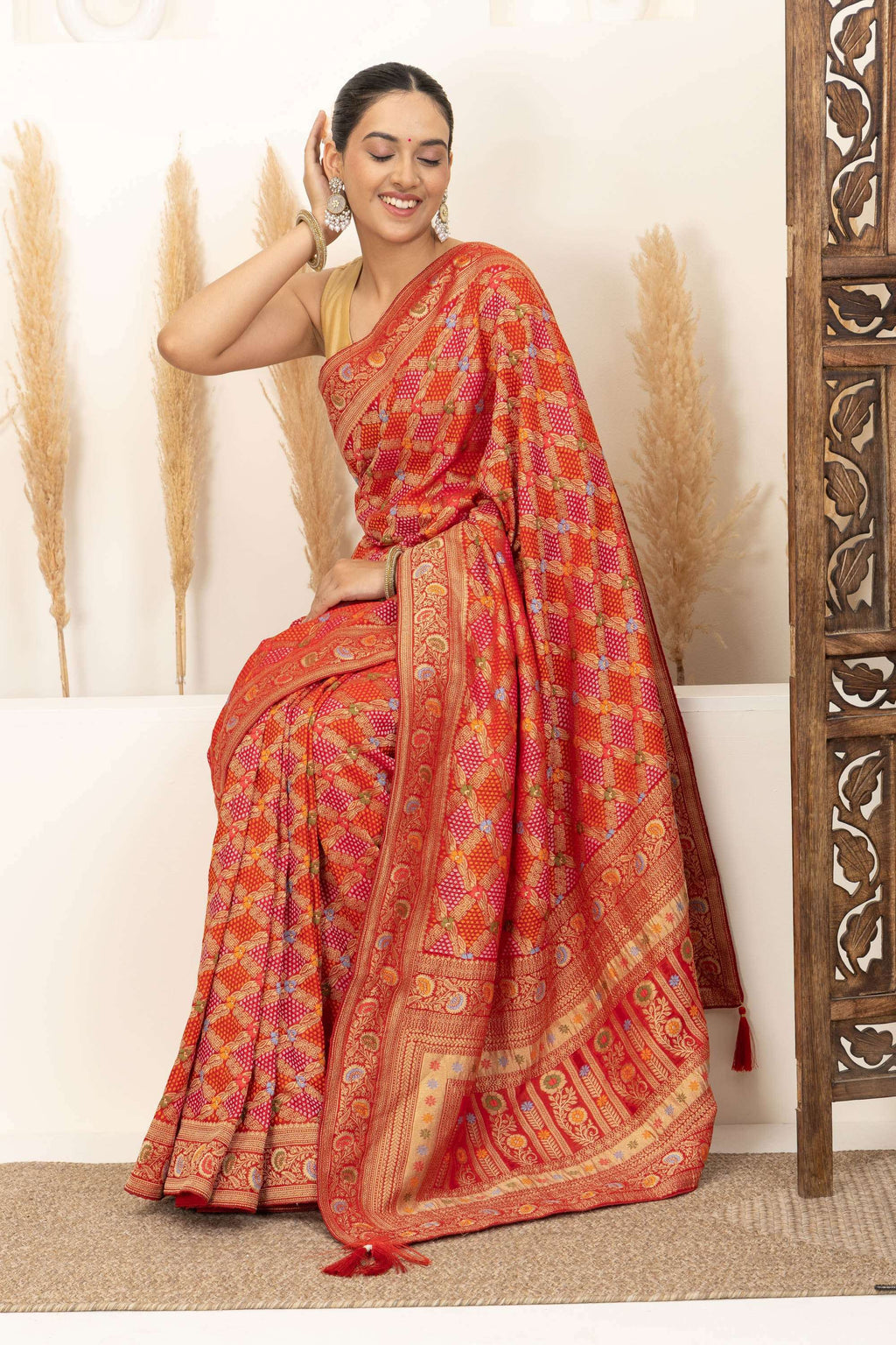 Warm Orange Saree with Multicolor Woven Artistry