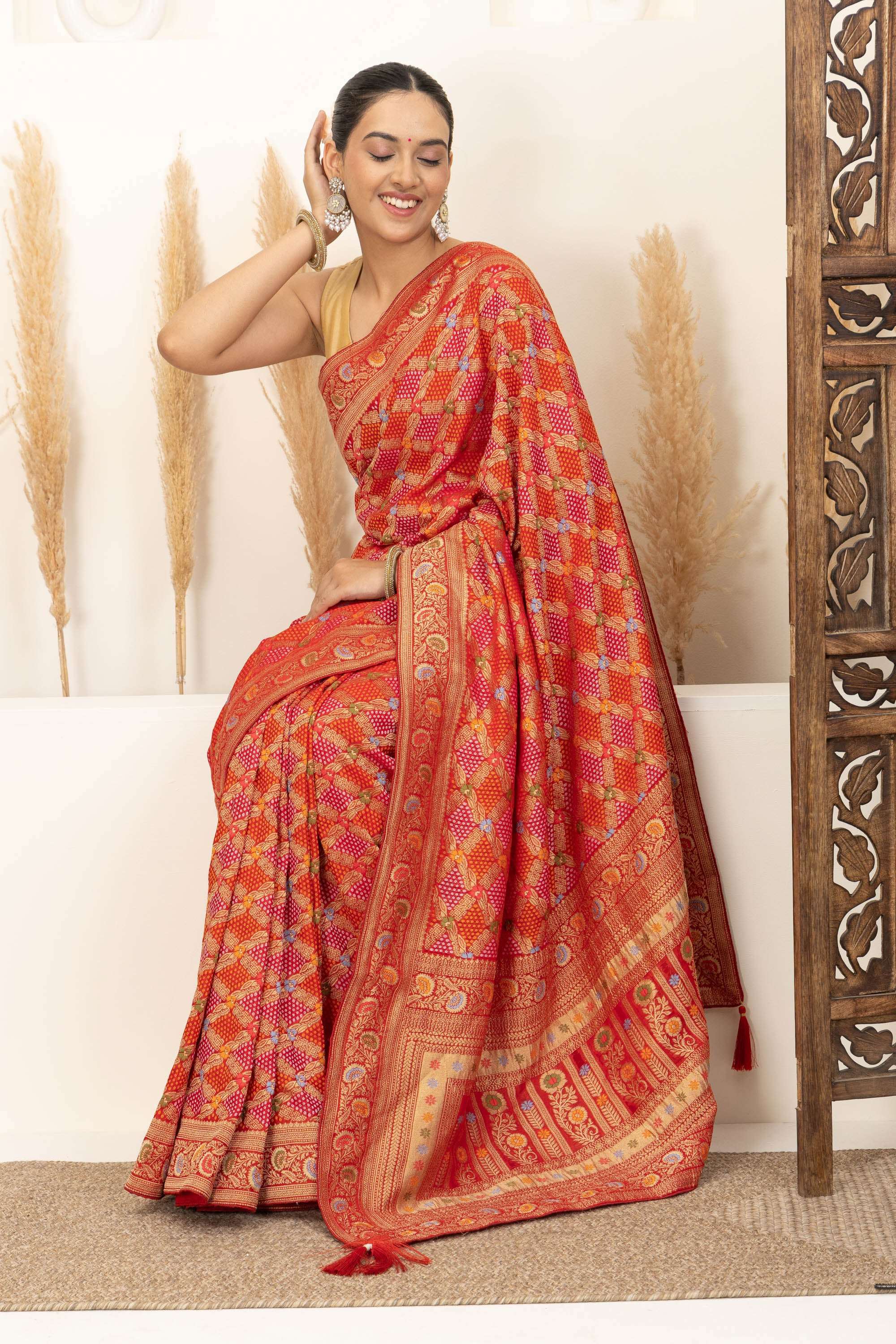 Warm Orange Saree with Multicolor Woven Artistry