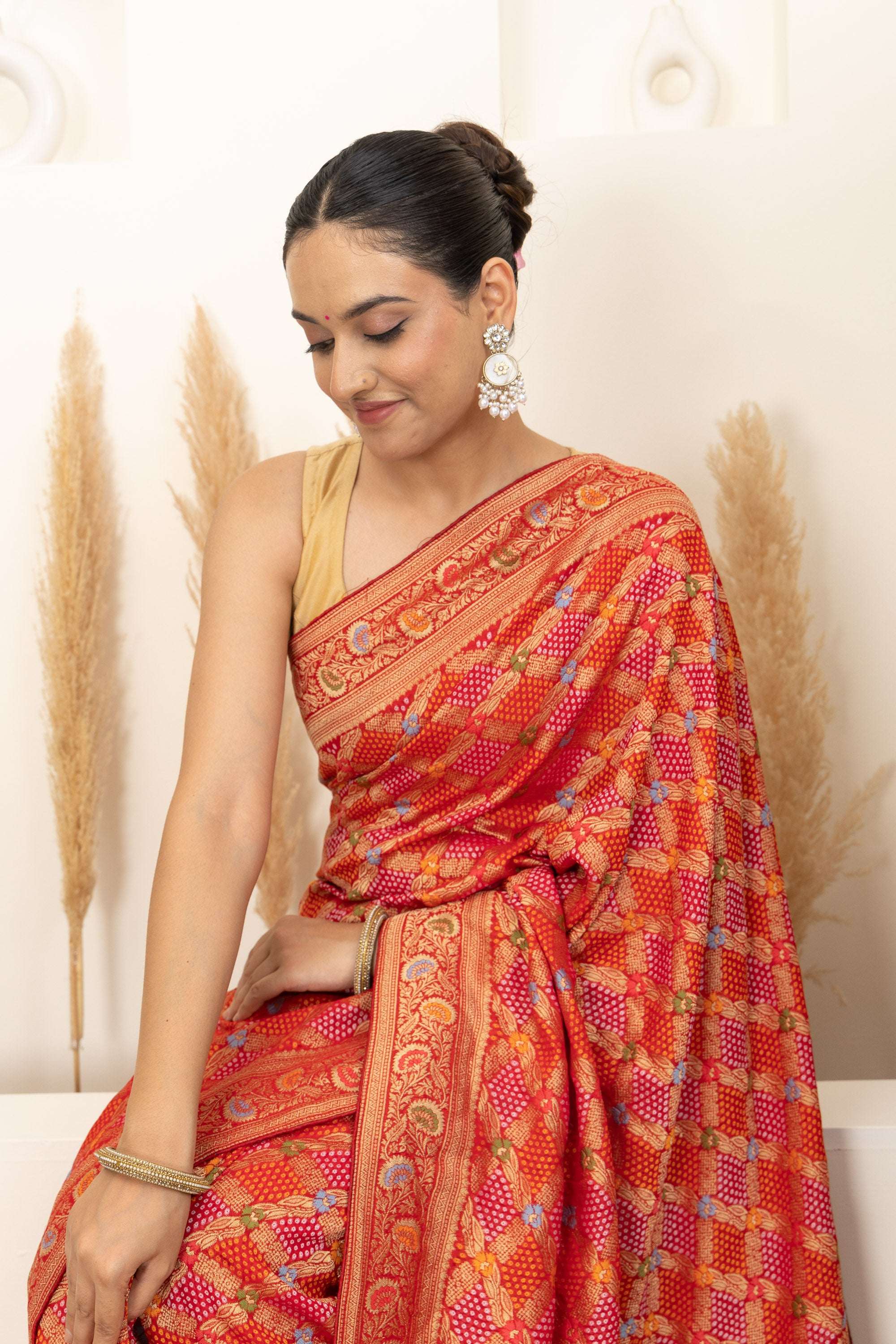 Warm Orange Saree with Multicolor Woven Artistry