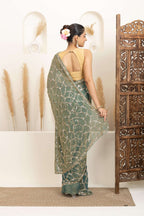 Sage Green Saree with Intricate Silver Embellishments