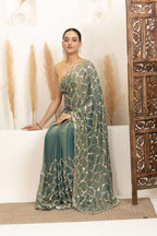 Sage Green Saree with Intricate Silver Embellishments