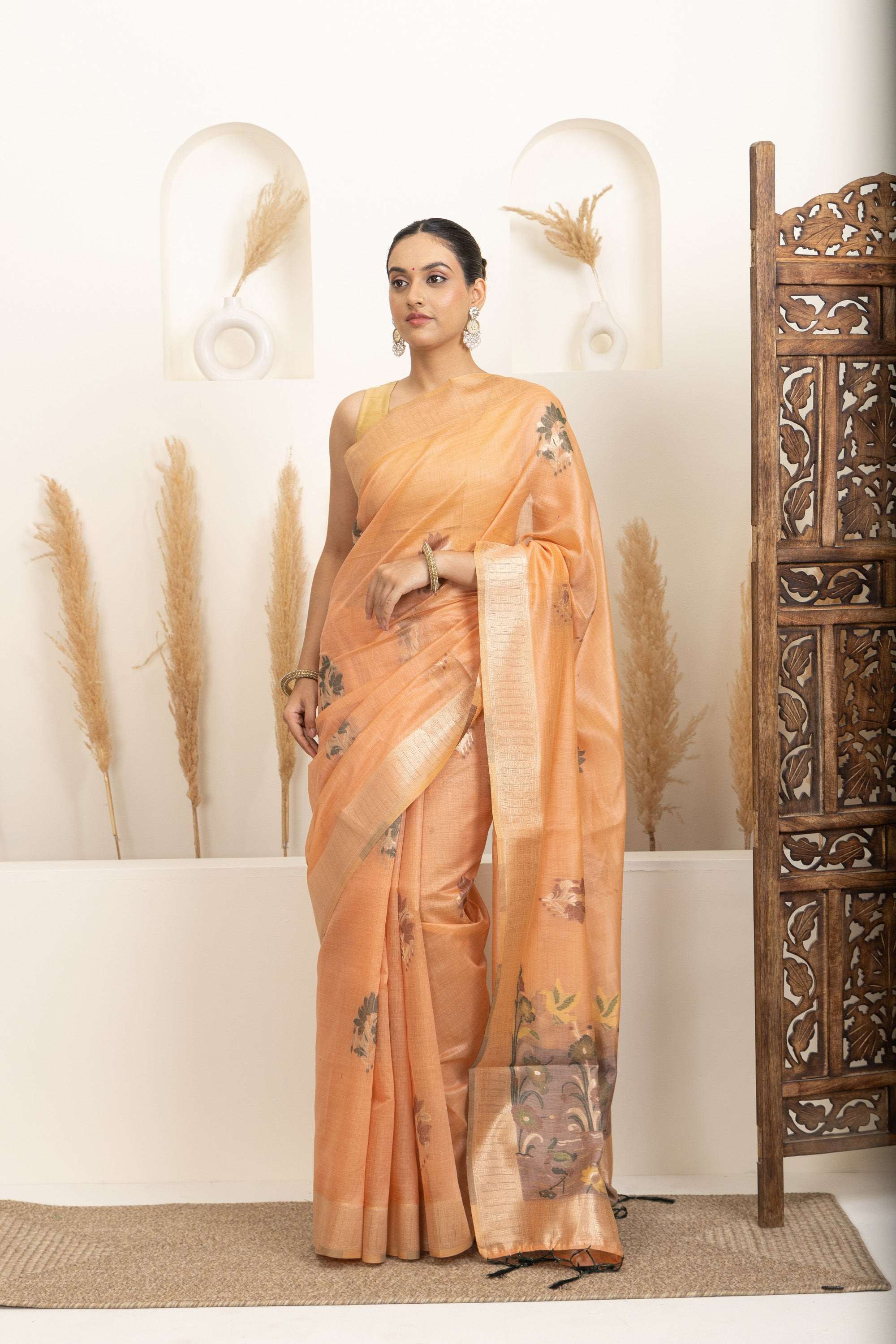 Soft Peach Saree with Earthy Floral Accents