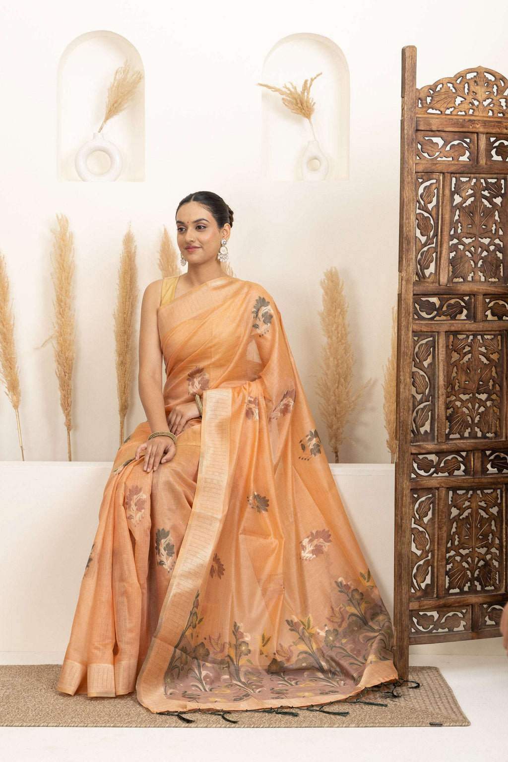 Soft Peach Saree with Earthy Floral Accents