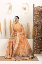 Soft Peach Saree with Earthy Floral Accents