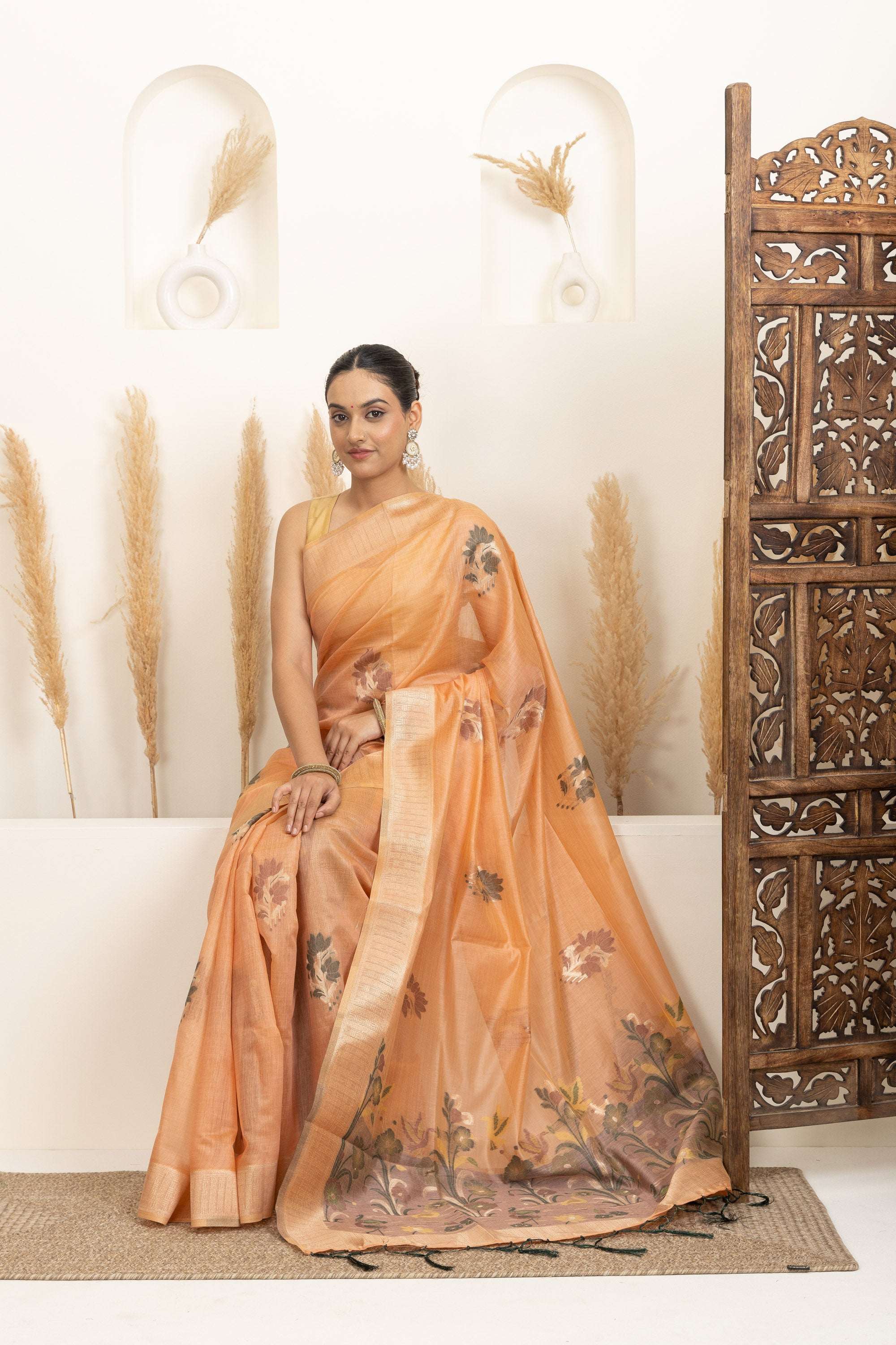 Soft Peach Saree with Earthy Floral Accents