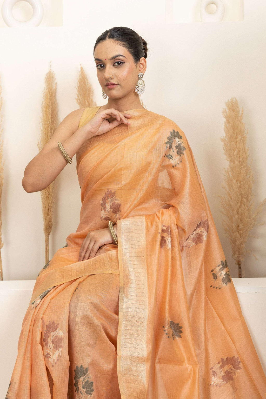 Soft Peach Saree with Earthy Floral Accents