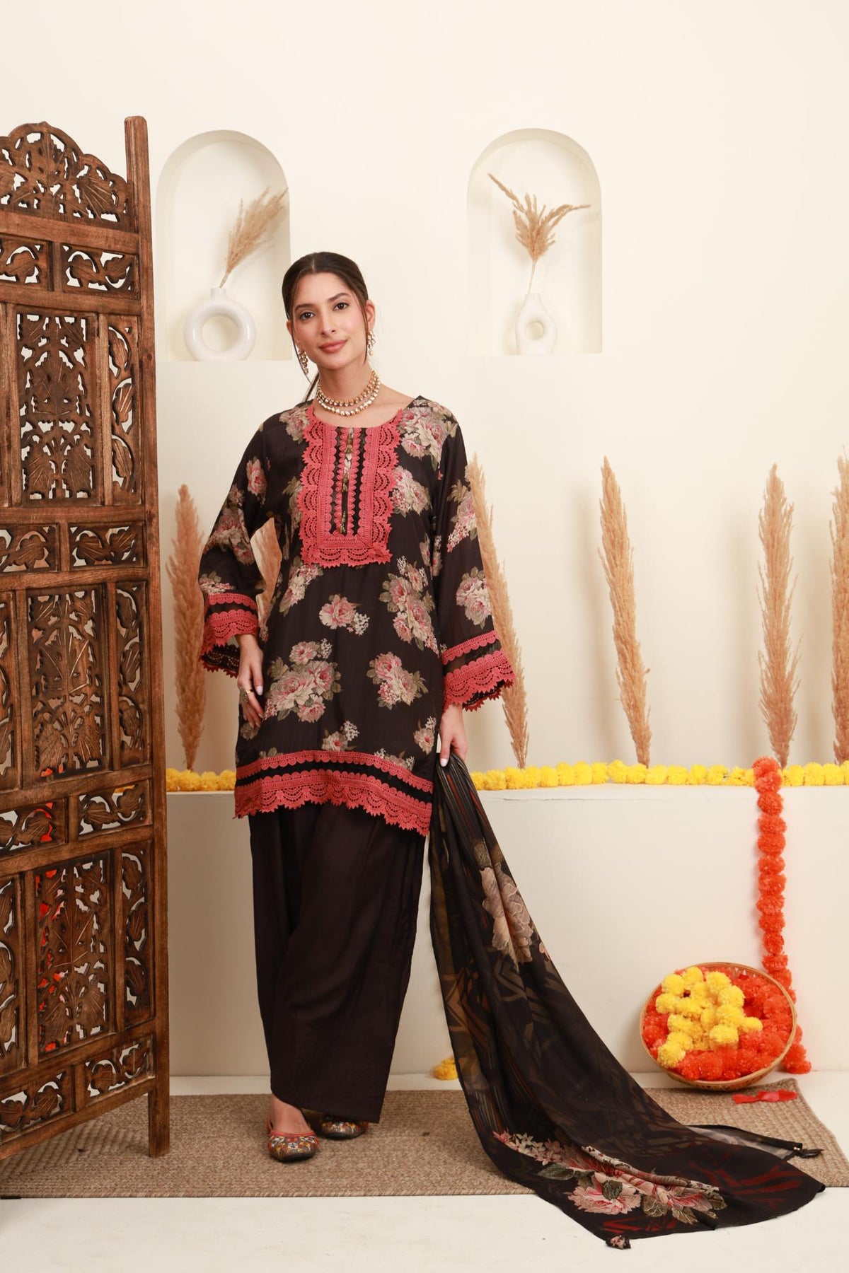 Black floral Farshi Salwar set for women with coral embroidered kurta and dupatta