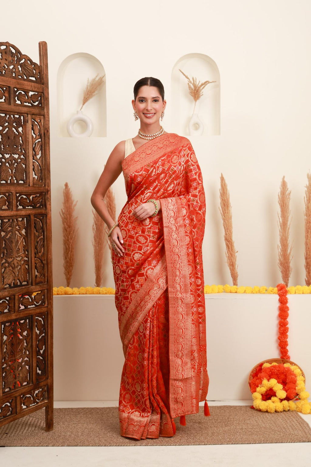 Coral orange traditional motif saree for women with gold border