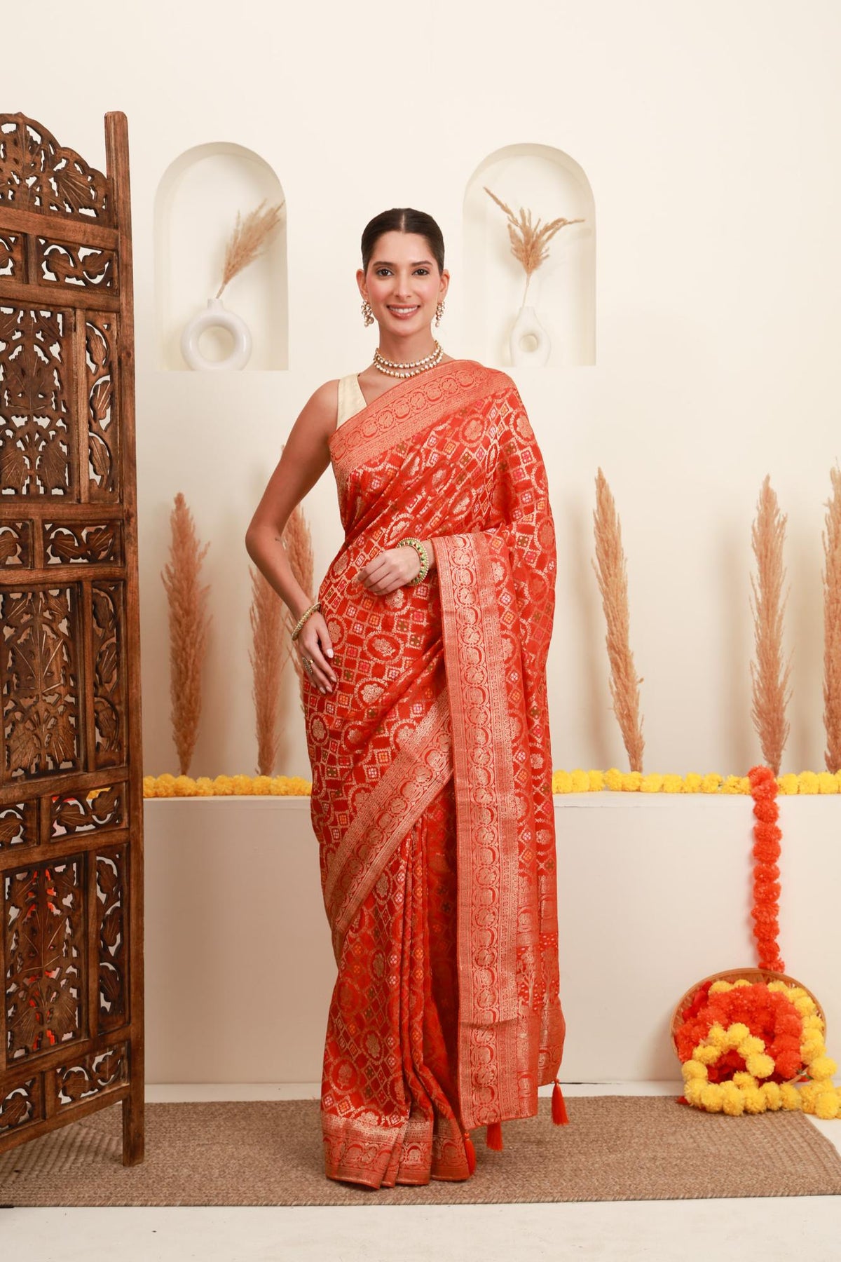 Coral orange traditional motif saree for women with gold border