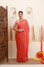 Coral scalloped saree for women with floral embellishments