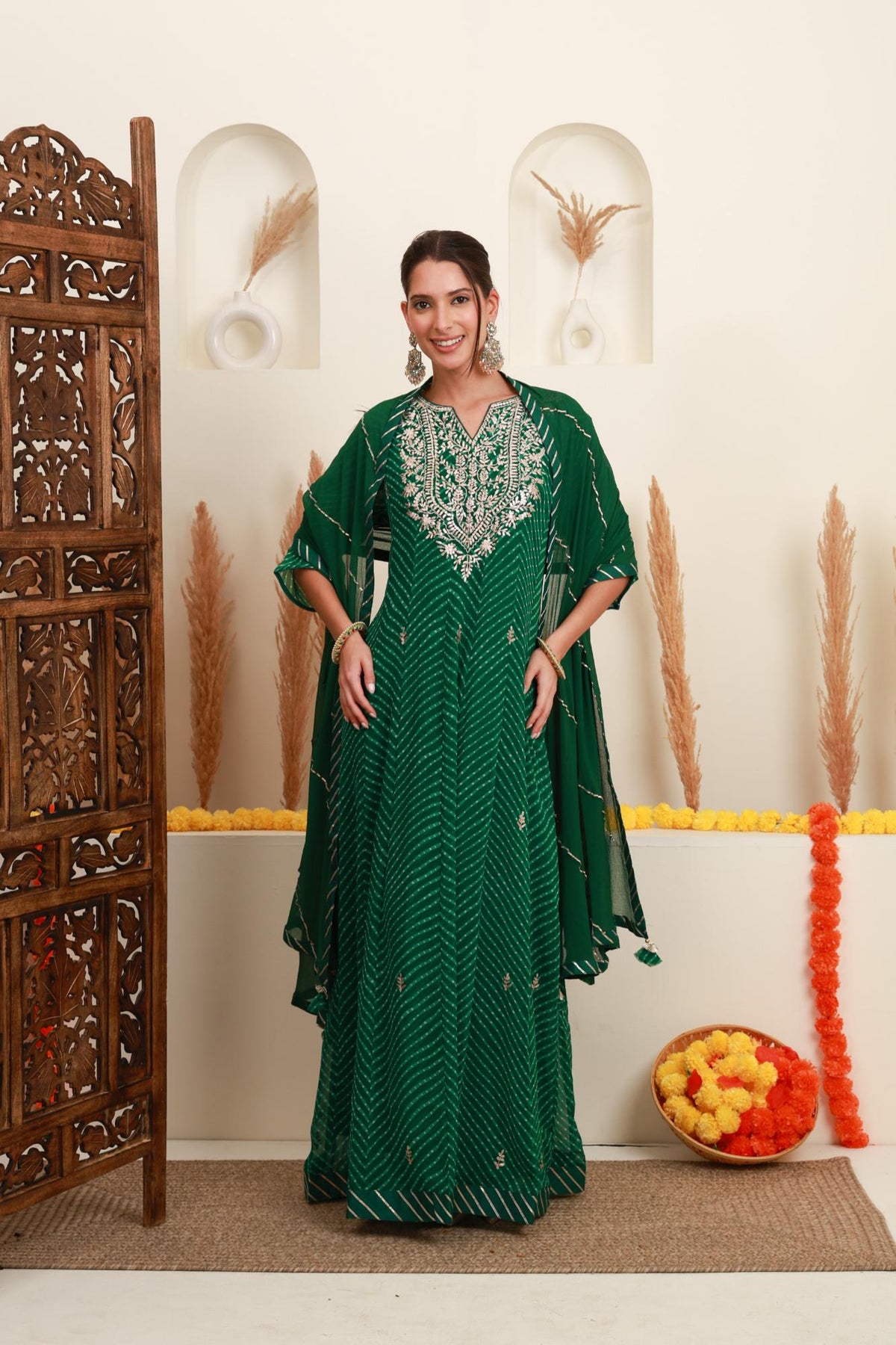 Emerald green embroidered kurta skirt set for women with striped dupatta