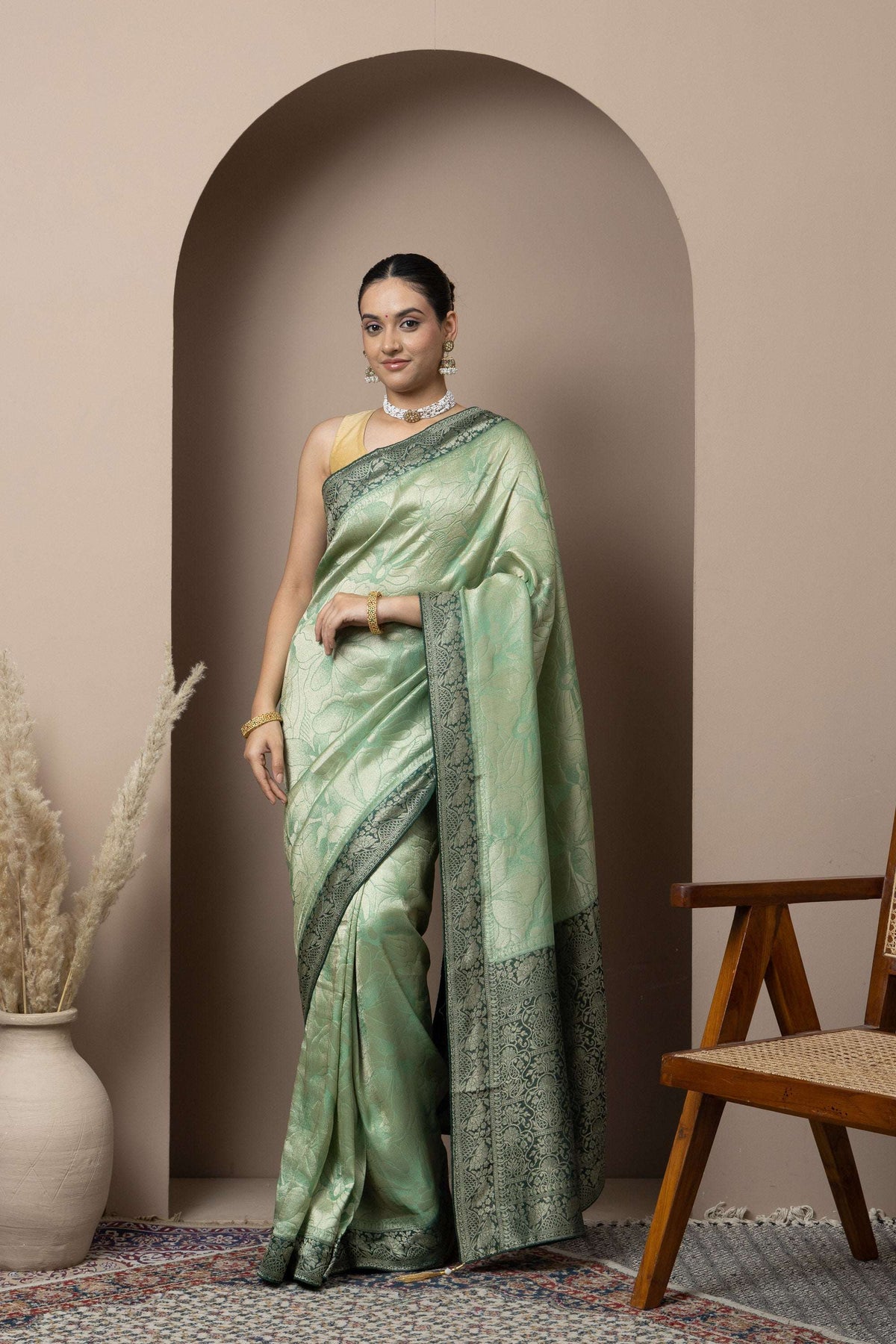 Mint Green Saree with Contrasting Zari Accents Design