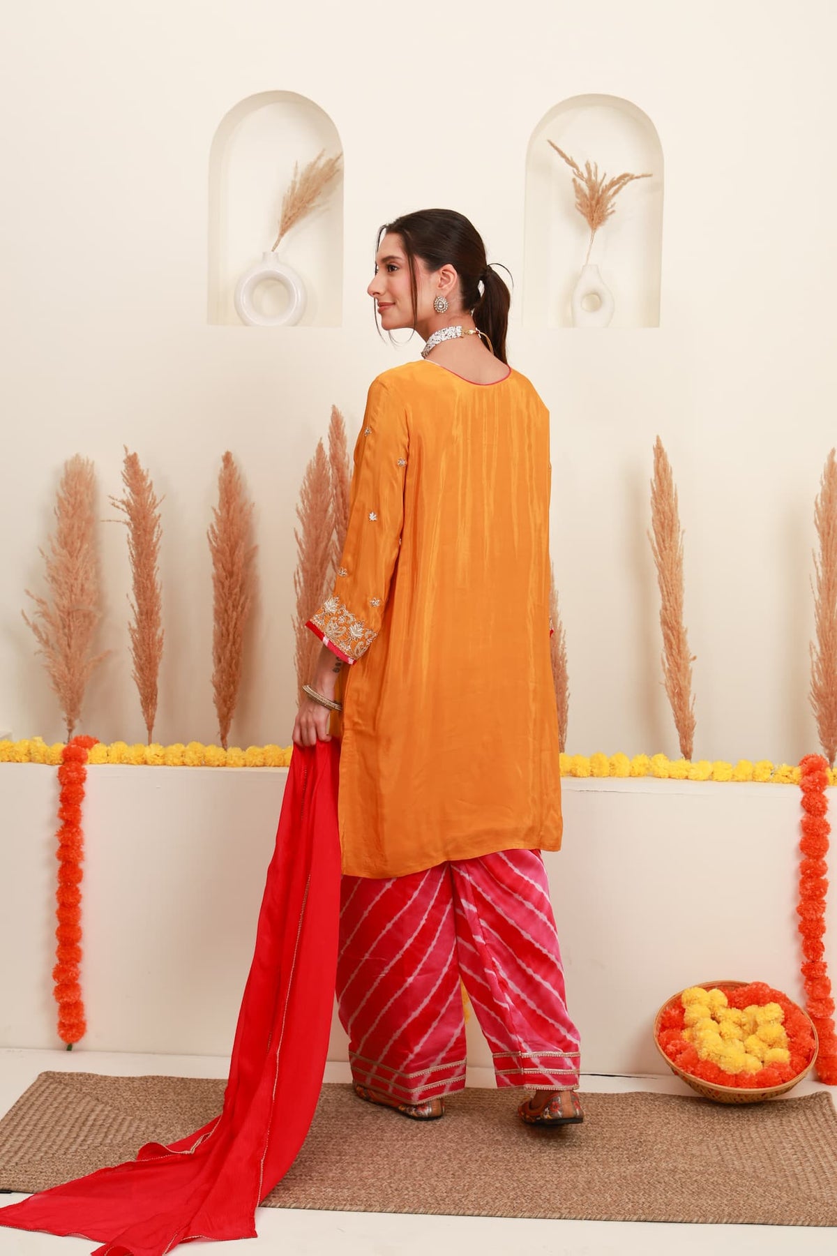 Orange and red embroidered kurta with Farshi Salwar and red dupatta2