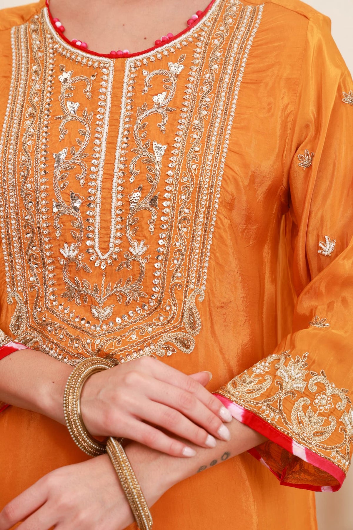 Orange and red embroidered kurta with Farshi Salwar and red dupatta3
