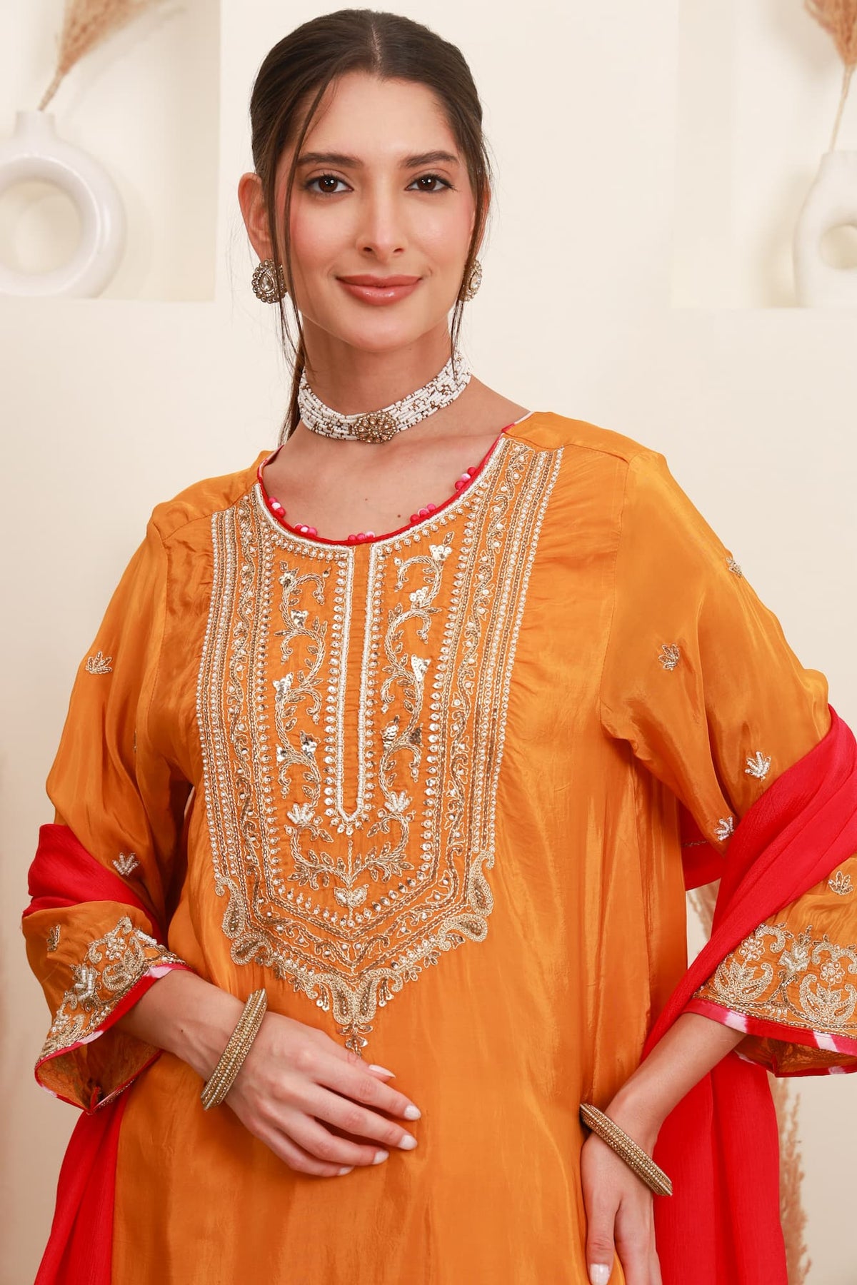 Orange and red embroidered kurta with Farshi Salwar and red dupatta4